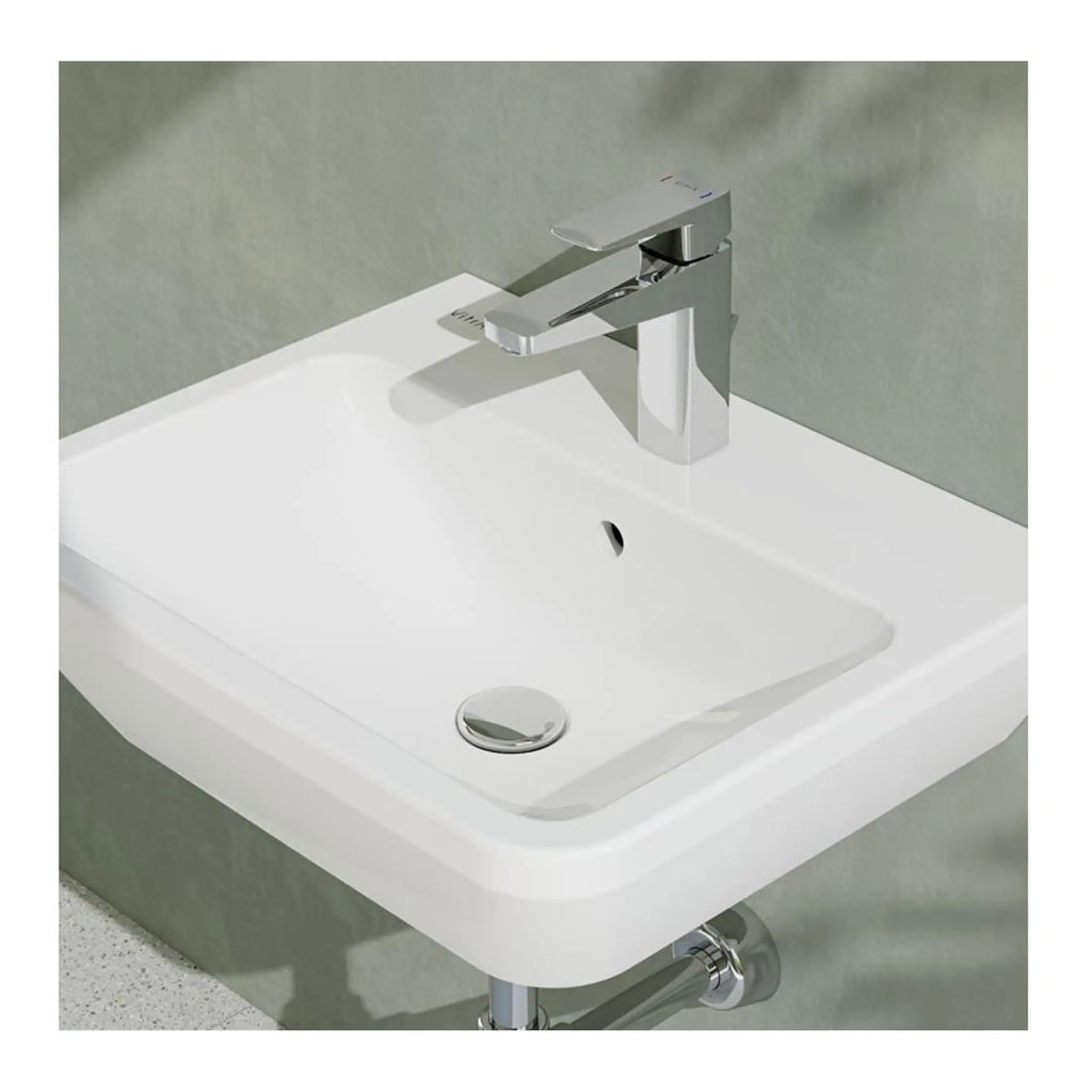 Modern white bathroom sink with chrome faucet and wall-mounted design, ideal for contemporary bathroom interiors and space-saving installations.