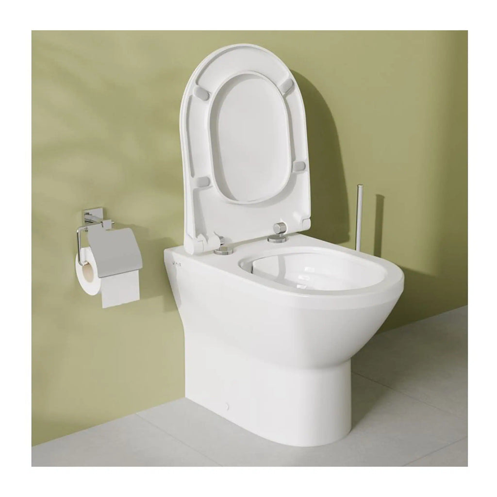 Toilet with advanced hygiene features and soft-close seat, modern design in bright white, ideal for contemporary bathrooms, accompanied by toilet paper holder and cleaning brush for a complete setup.