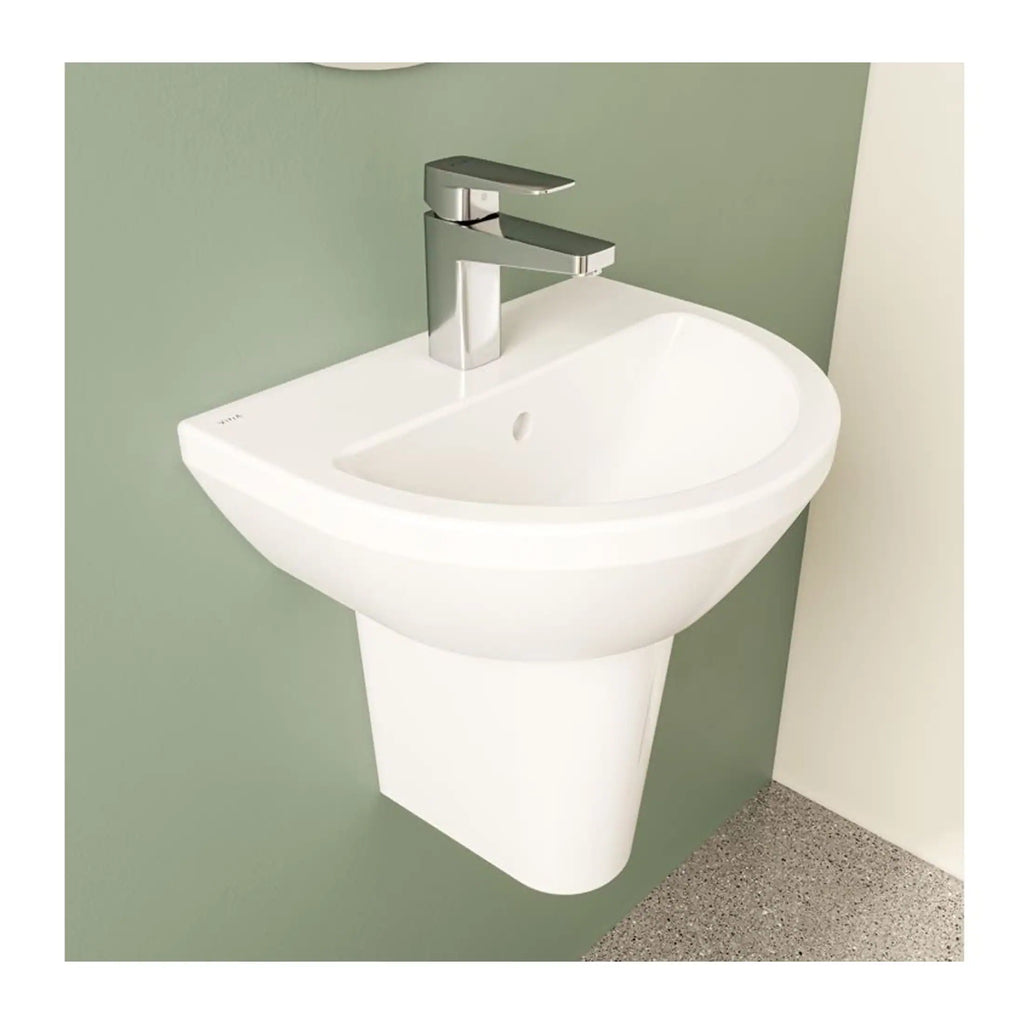 Modern white bathroom sink with sleek chrome tap, wall-mounted design, perfect for contemporary bathrooms, showcasing stylish and functional bathroom fixtures.