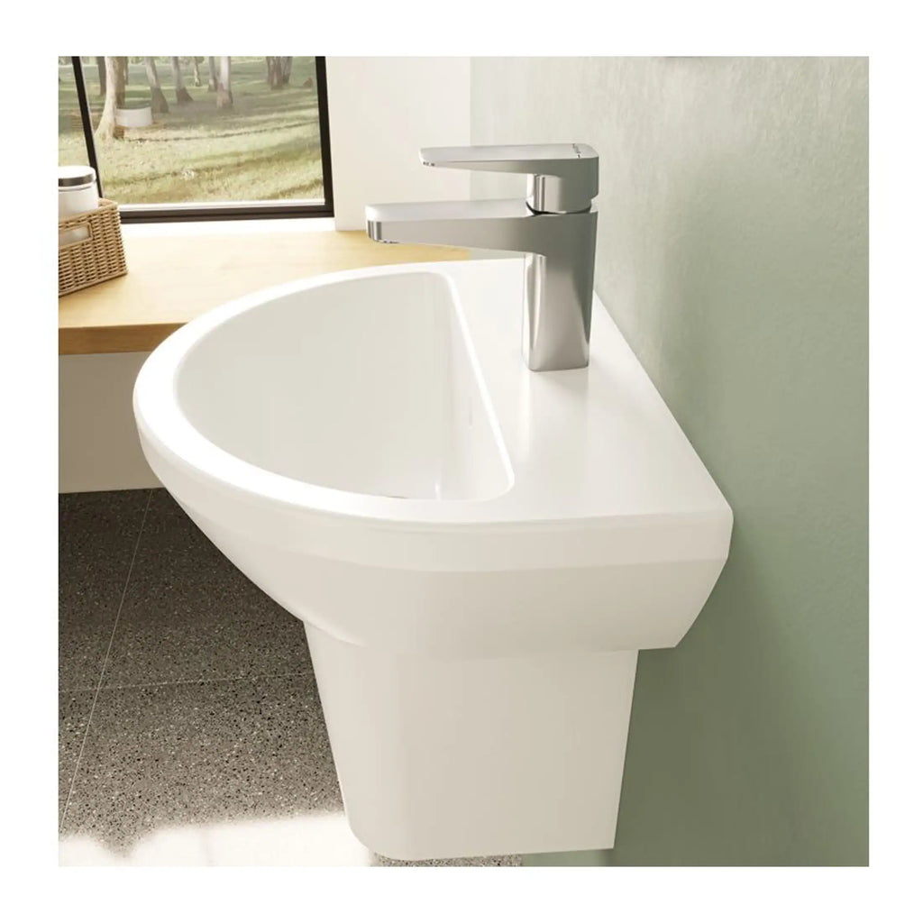 Sleek white wall-mounted bathroom sink with modern chrome faucet, ideal for contemporary bathroom designs. Perfect for space-saving and stylish bathroom installations.