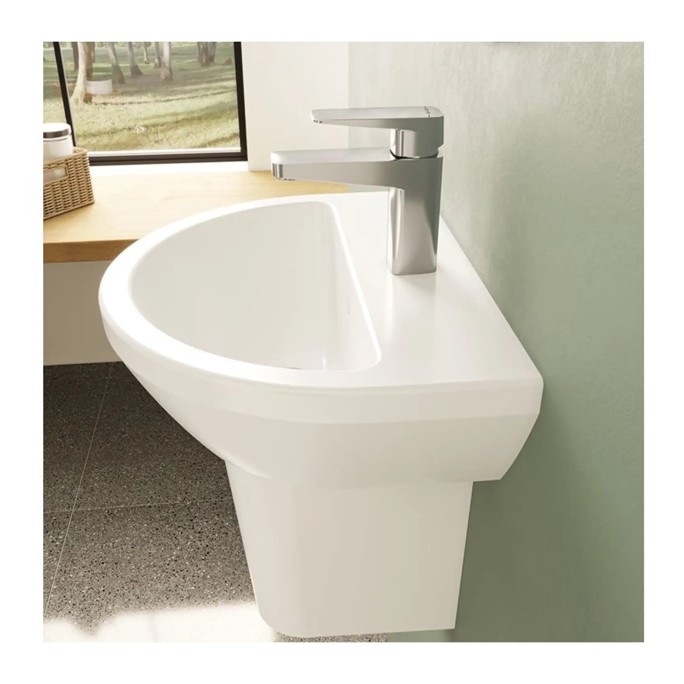 Sleek white wall-mounted bathroom sink with modern chrome faucet, ideal for contemporary bathroom designs. Perfect for space-saving and stylish bathroom installations.