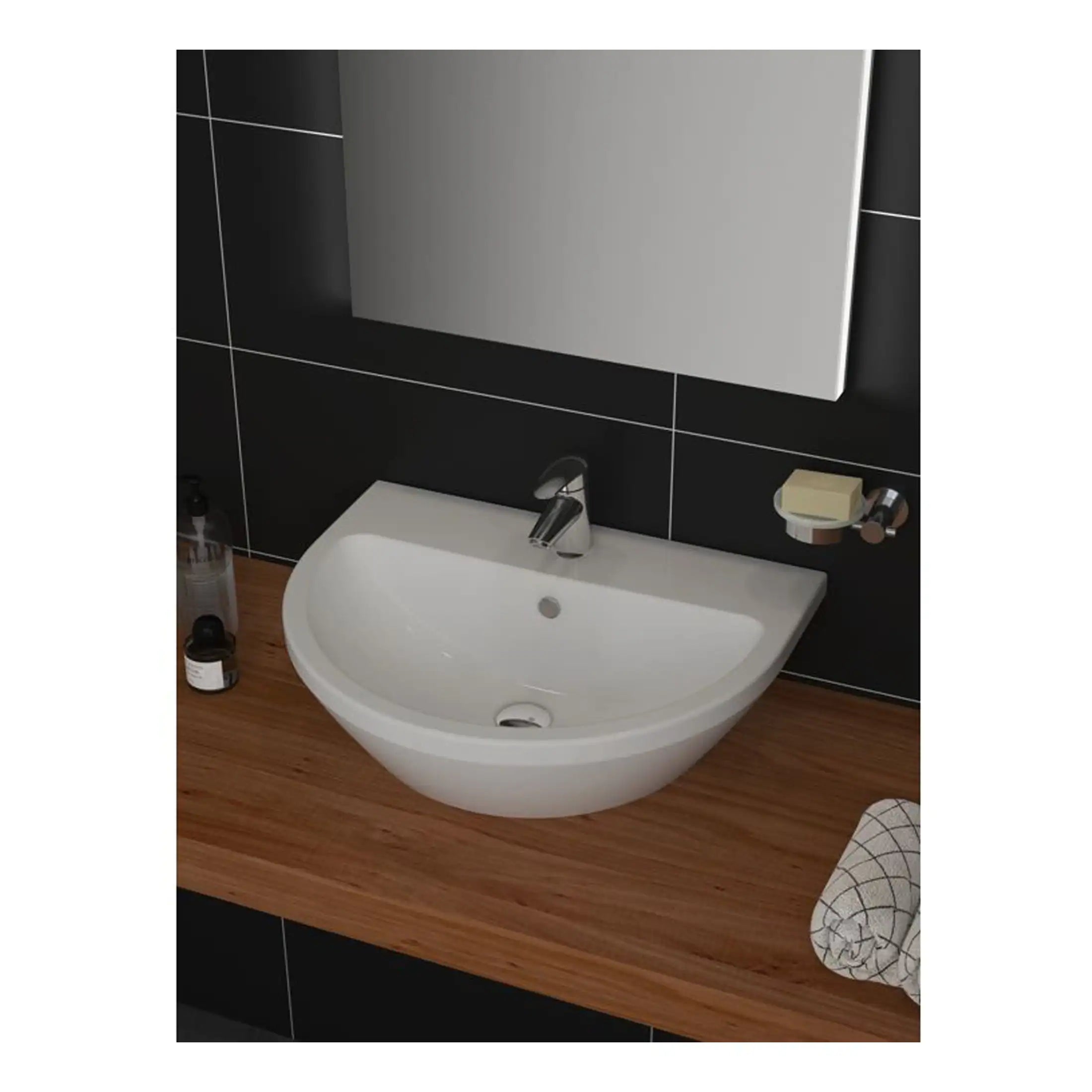 Shower room with modern wall-mounted basin, sleek chrome tap, black tiled walls, wooden countertop with soap dish, and bathroom essentials, showcasing contemporary bathroom design.