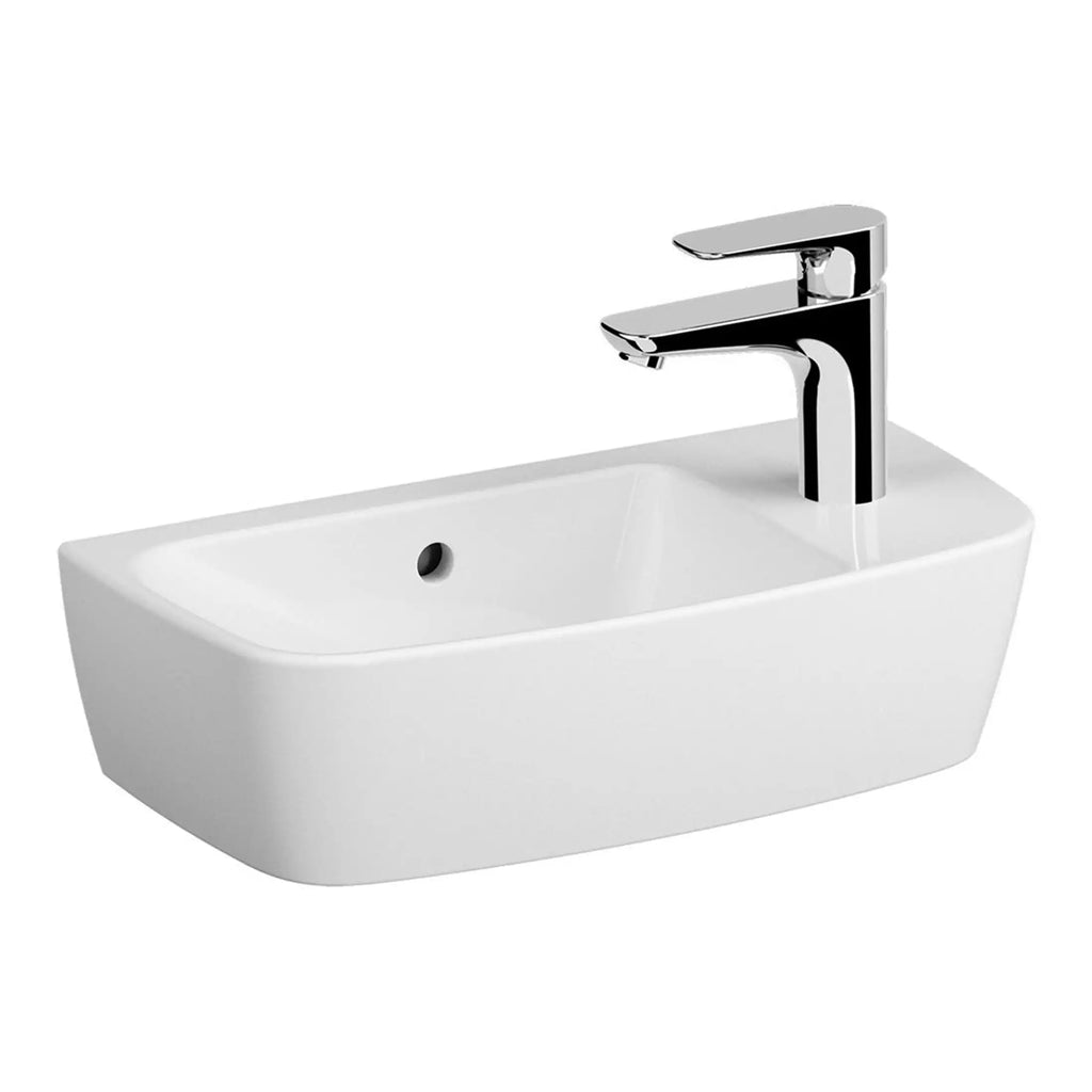 Silver modern bathroom sink with chrome faucet demonstrating contemporary bathroom design.
