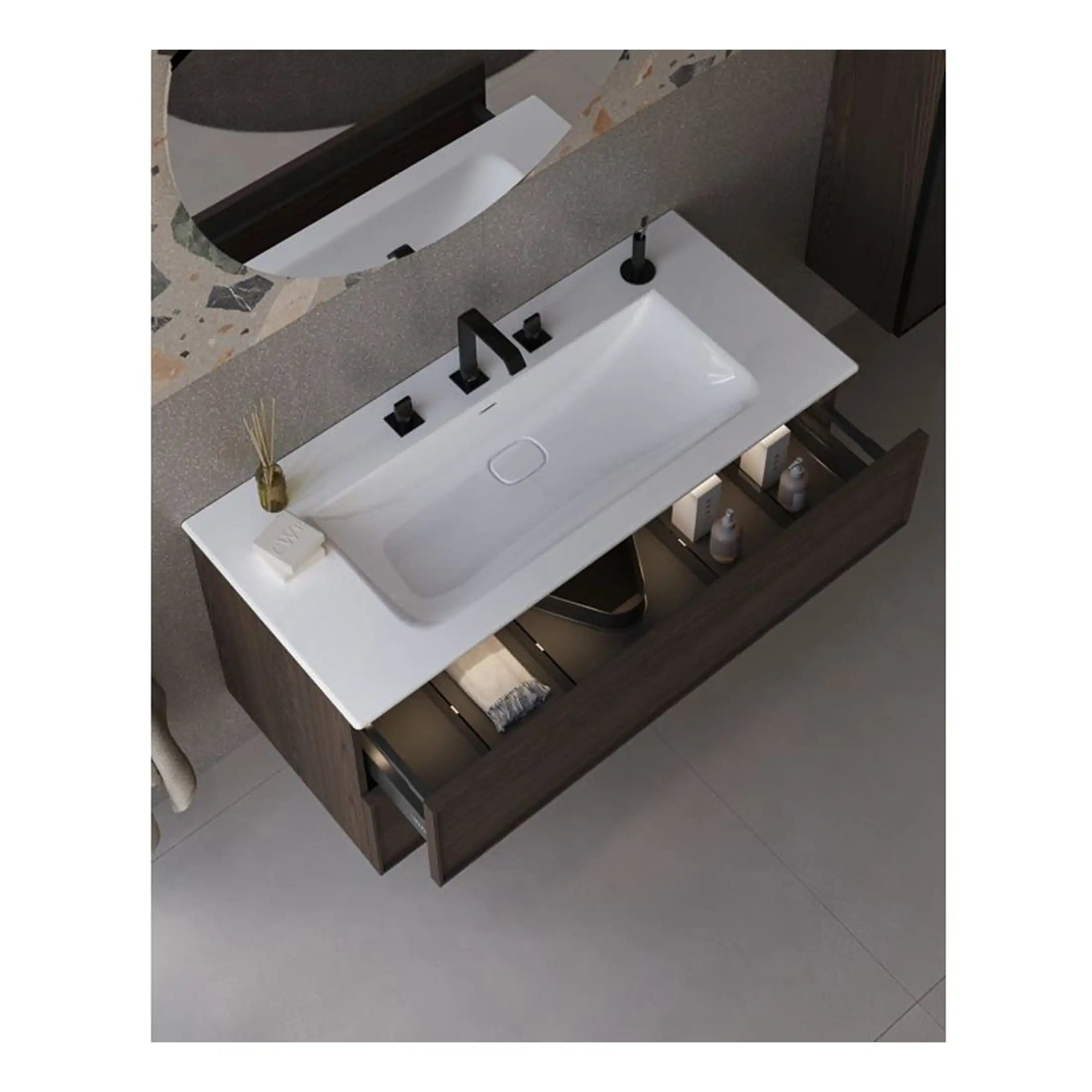 Modern bathroom vanity with a white countertop basin, black fixtures, and a wooden storage cabinet. Perfect for contemporary bathrooms, combining style and functionality.