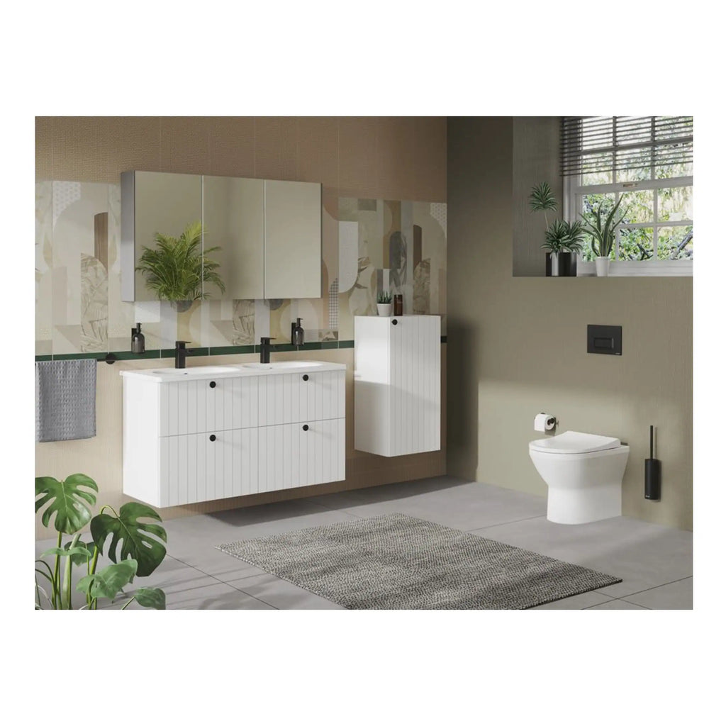 Contemporary white bathroom vanity with dual sinks, wall-mounted mirror cabinets, and modern black fixtures in a stylish bathroom with natural light and green decor.