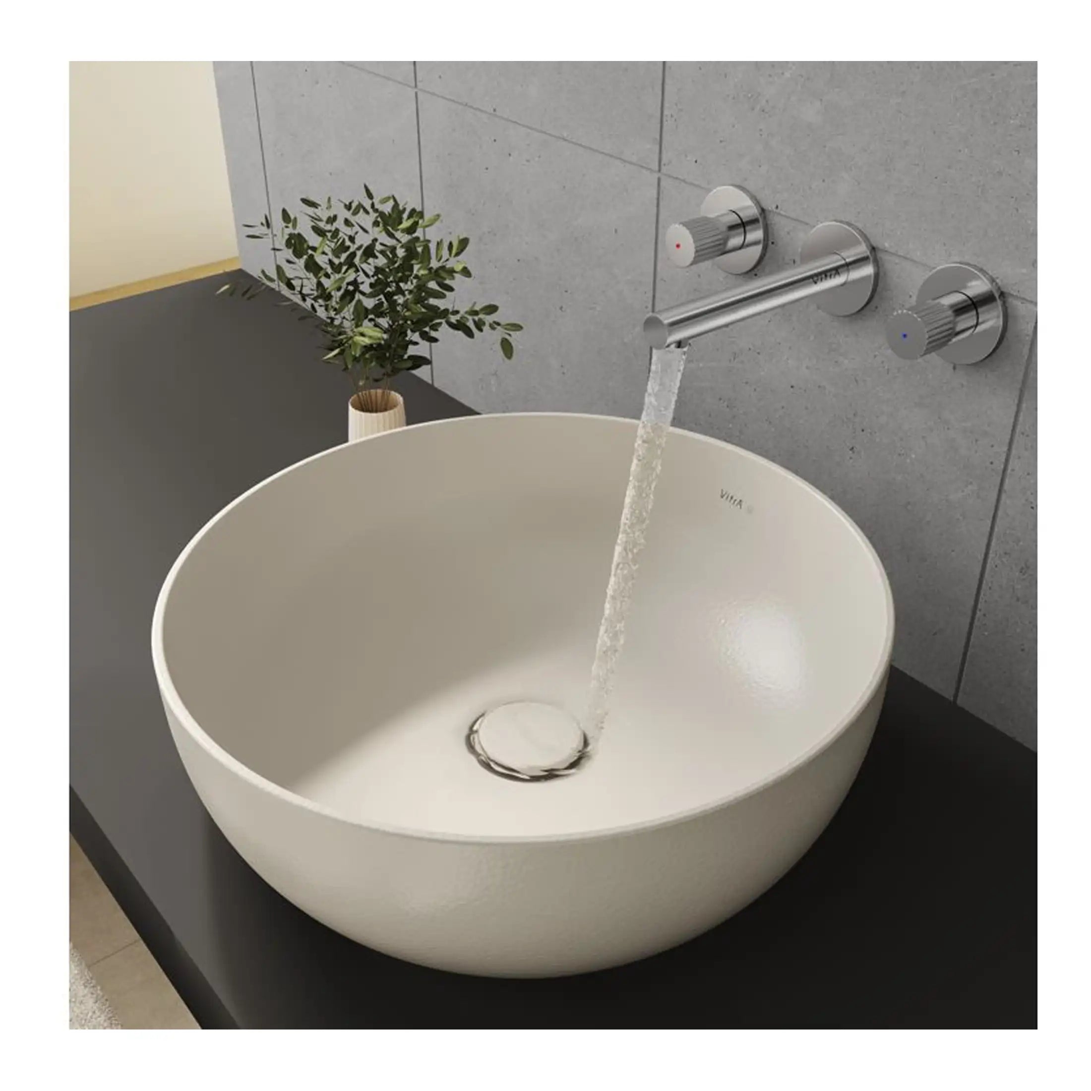 Sleek modern bathroom sink with wall-mounted mixer tap and grey tiled wall, minimalist design perfect for contemporary bathrooms.