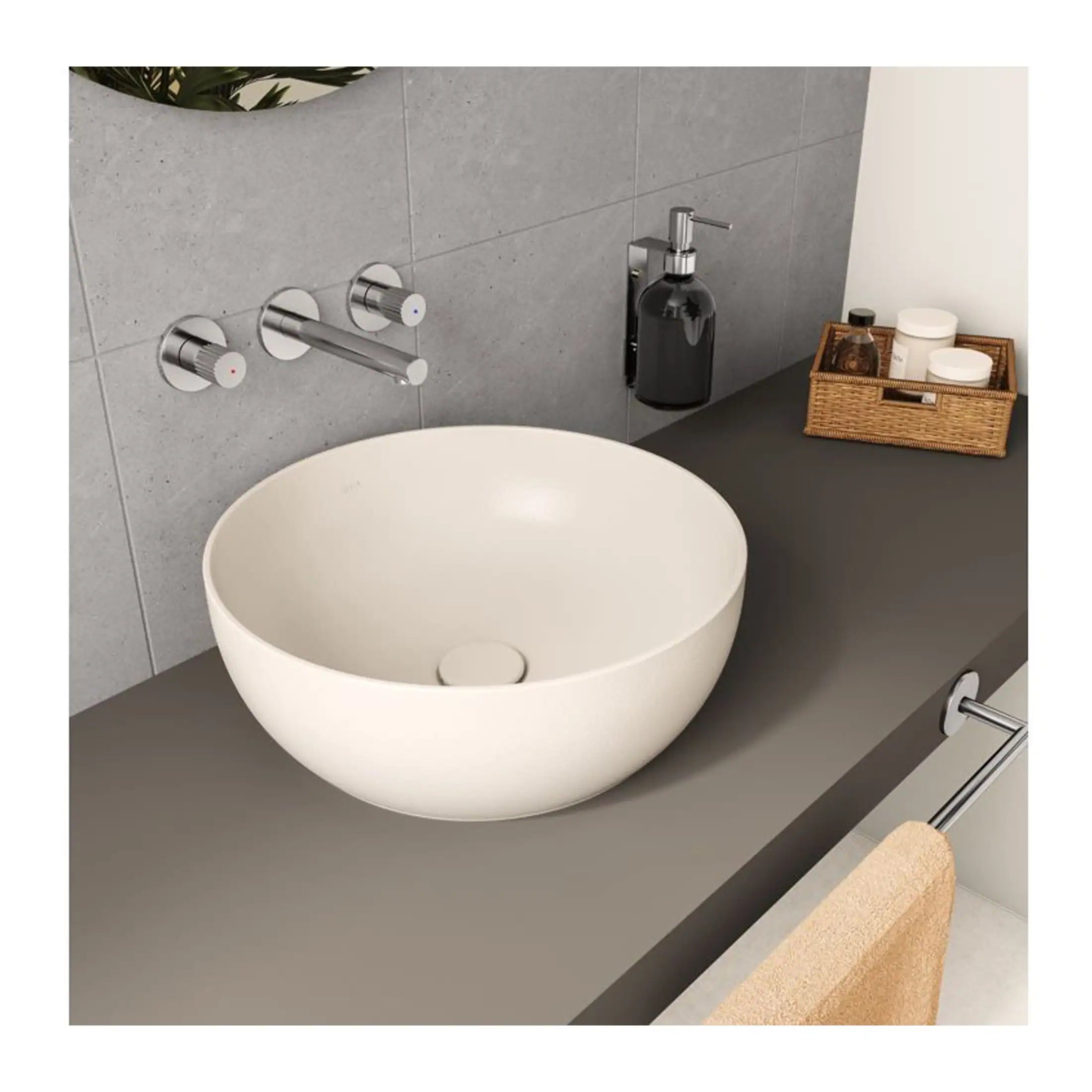 Organic white vessel sink bowl with modern chrome wall-mounted tap and minimalist bathroom accessories for elegant bathroom design.