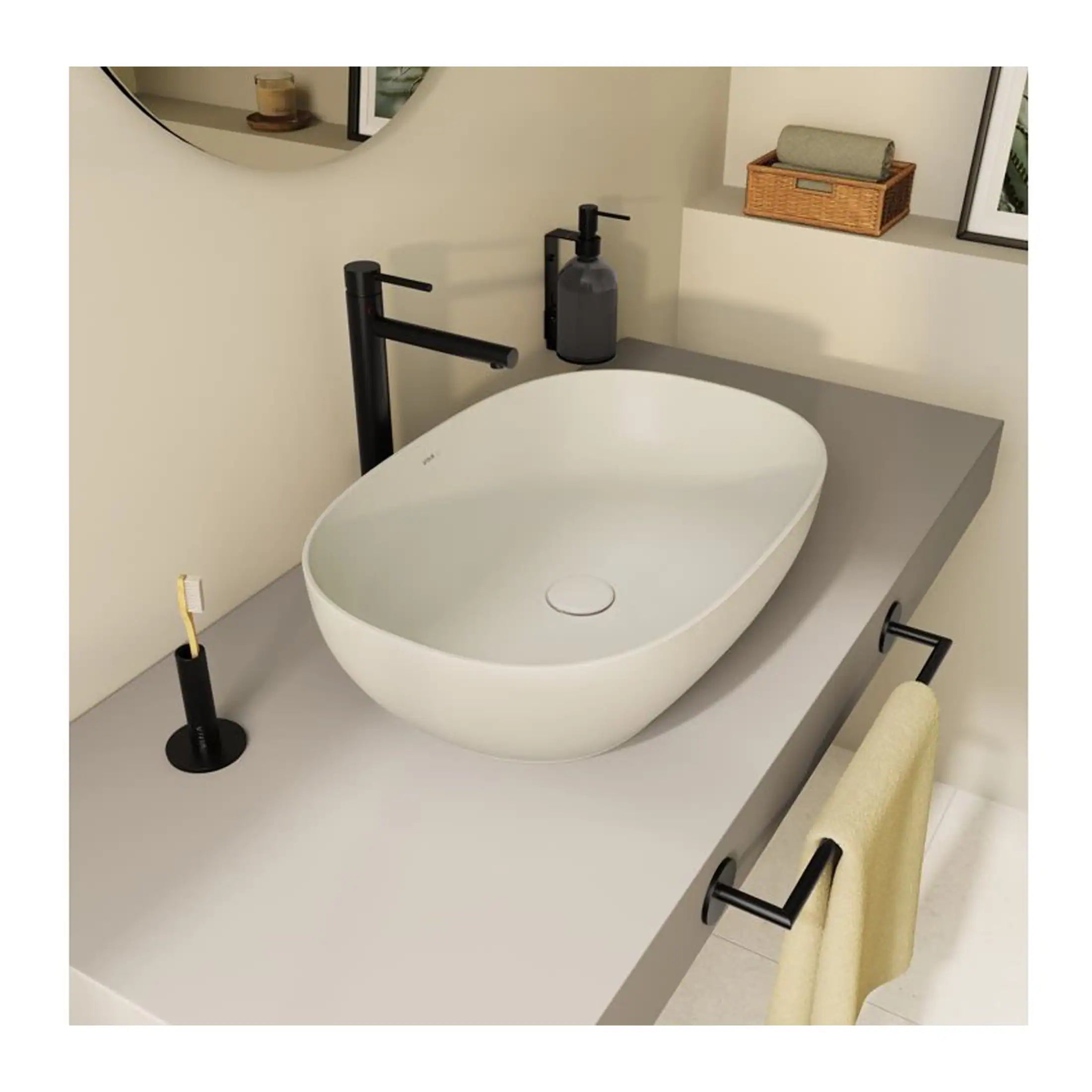 Smooth oval white bathroom sink with modern black tap and bathroom accessories, minimalist vanity with towel rail, natural neutral tones, contemporary bathroom design, bubly bathrooms UK.