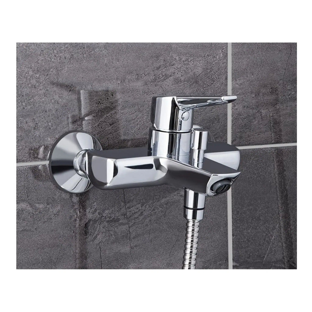 Chrome bathroom faucet with single lever and flexible hose, mounted on a grey tiled wall. Ideal for modern, stylish bathroom upgrades and efficient water control.