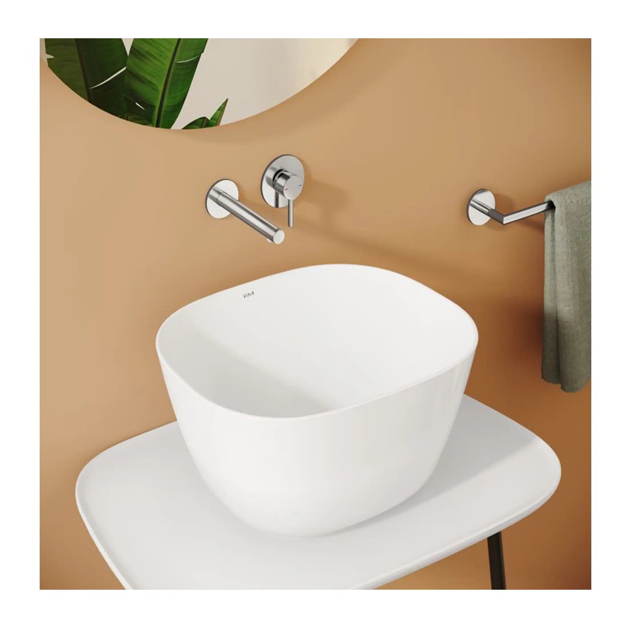 Sleek modern bathroom wash basin with wall-mounted taps and a beige wall background, suitable for minimalist bathroom interior design.