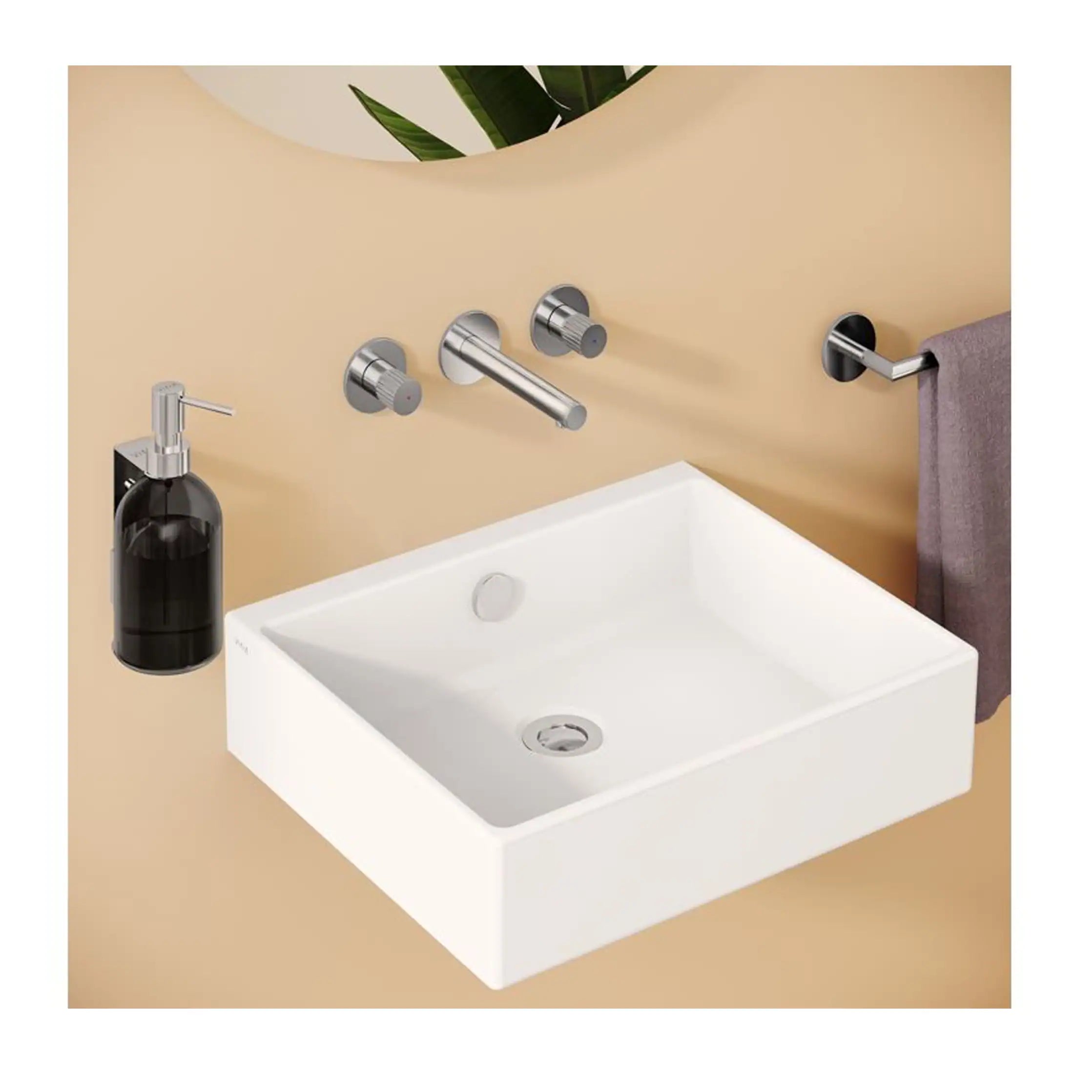 Sleek modern white bathroom sink with wall-mounted chrome taps and a wall-mounted soap dispenser, set against a neutral beige wall with a decorative mirror and towel ring, perfect for contemporary bathroom design.