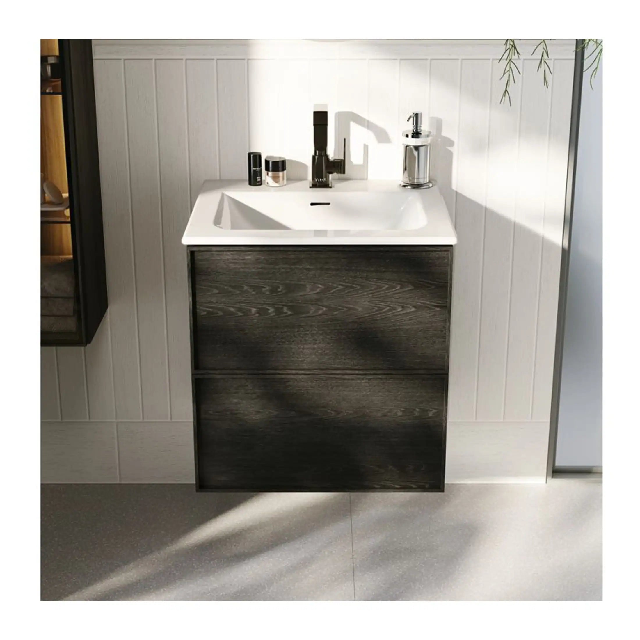 Contemporary bathroom vanity with dark wood finish and sleek countertop, featuring modern fixtures and accessories, set against a minimalist white tiled wall for stylish bathroom storage and design.