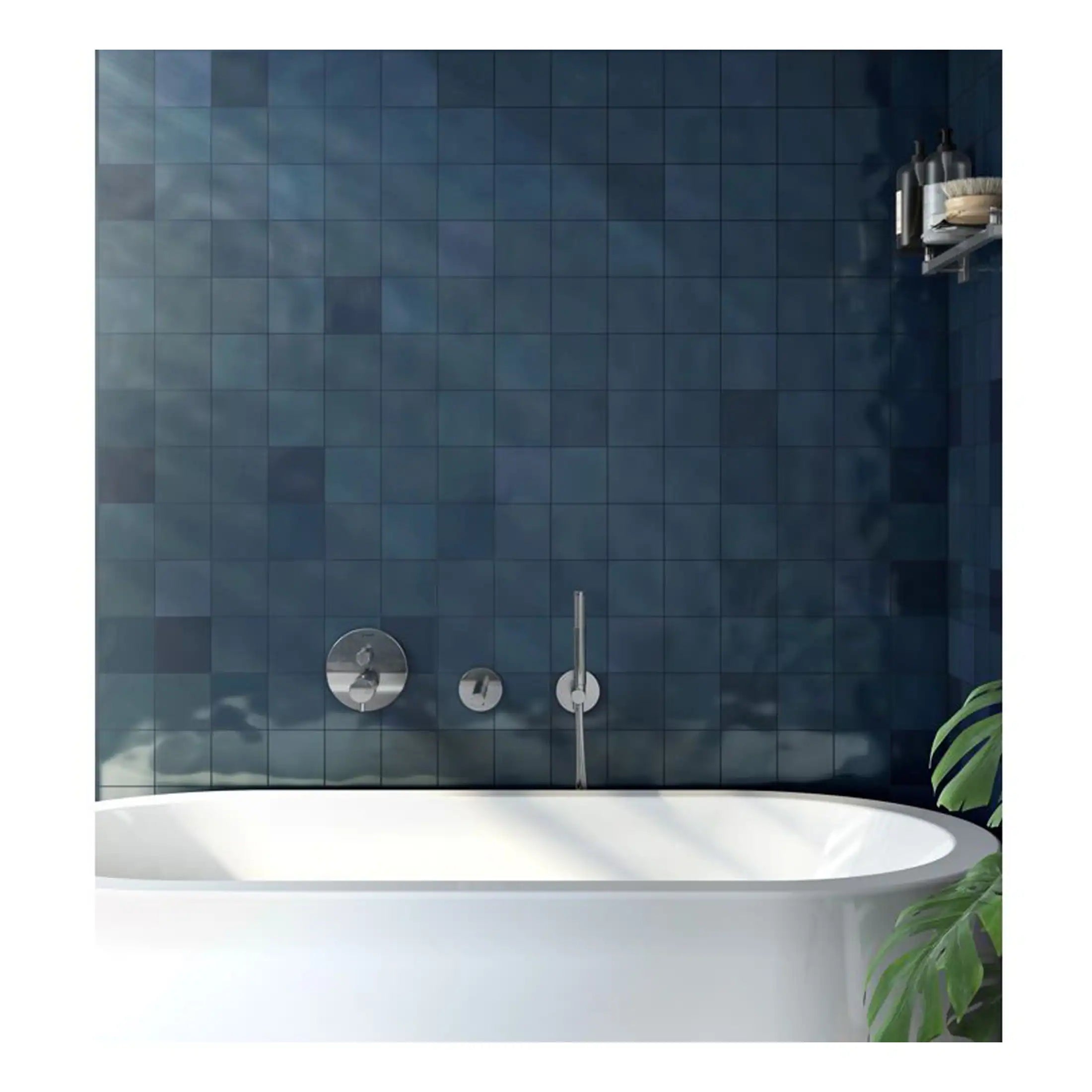 Refined modern bathroom with a stylish white bathtub, dark blue tiled wall, and chrome fixtures, perfect for a luxurious and contemporary bathroom renovation.