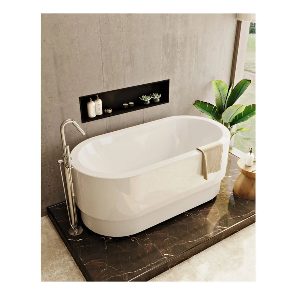 Sleek modern freestanding bathtub with chrome fittings in contemporary bathroom setting, featuring natural decor and minimalist design.
