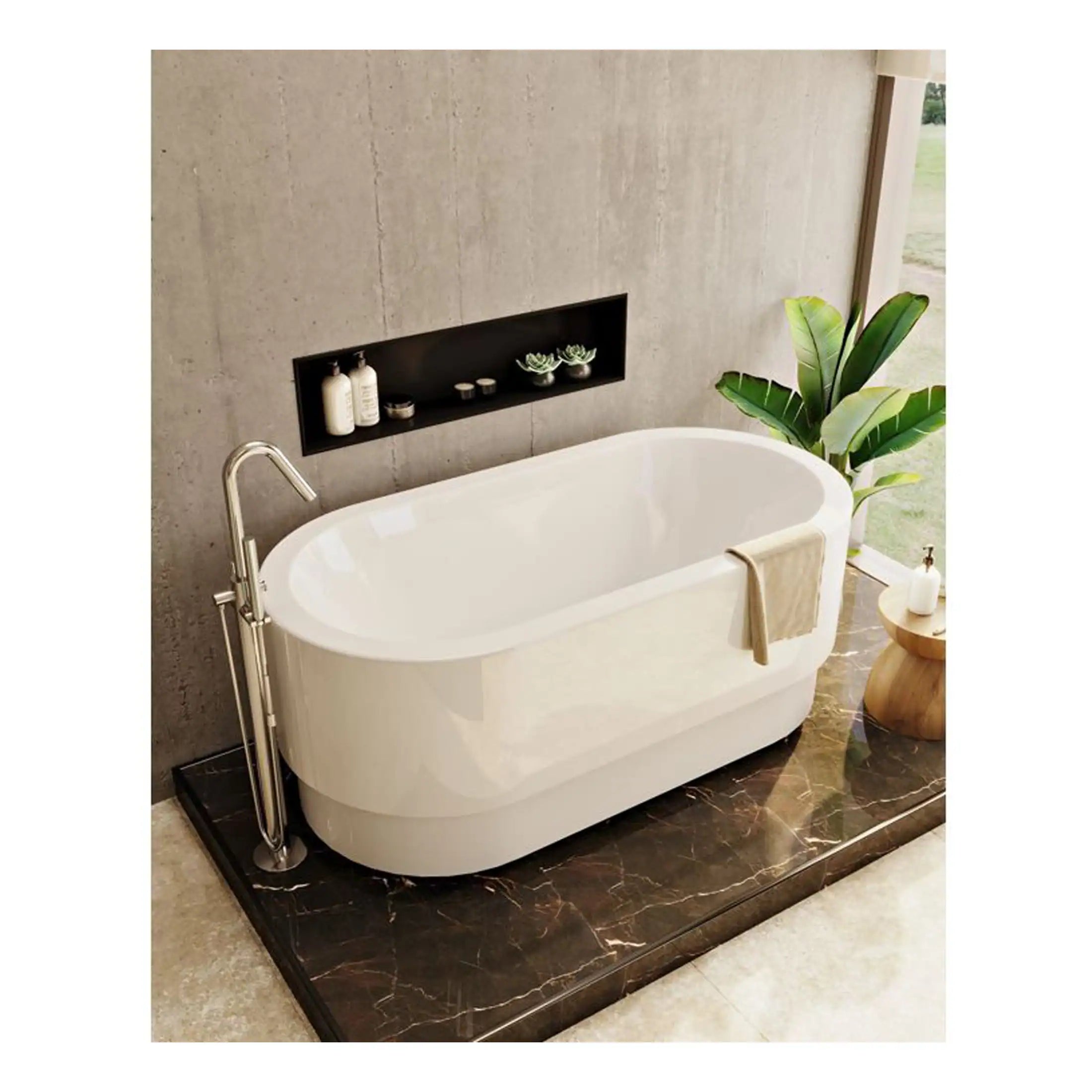 Sleek modern freestanding bathtub with chrome fittings in contemporary bathroom setting, featuring natural decor and minimalist design.