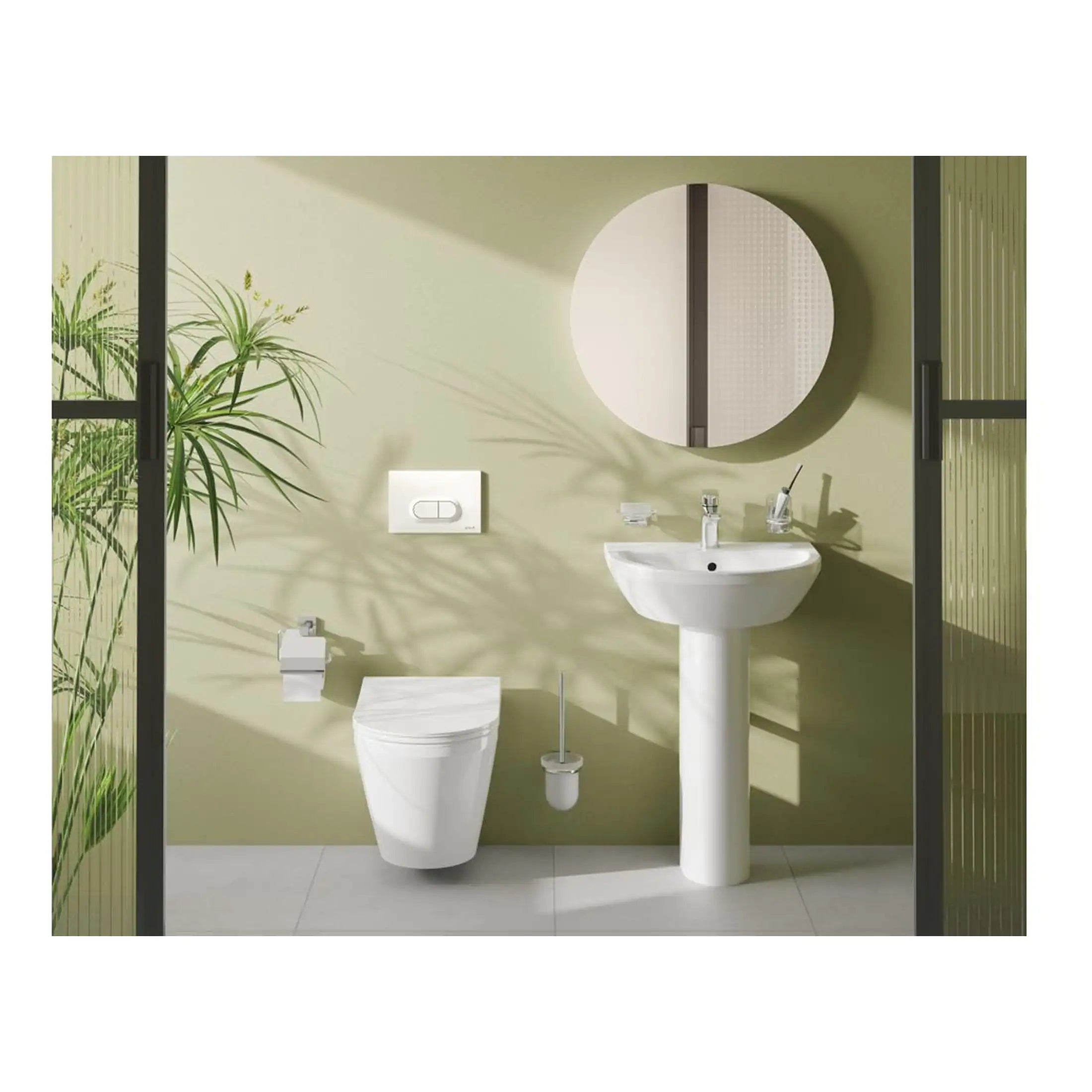 Sleek modern bathroom featuring white toilet and pedestal sink, large round mirror, and green accent wall, with natural light and potted plant for a fresh, minimalist bathroom design.