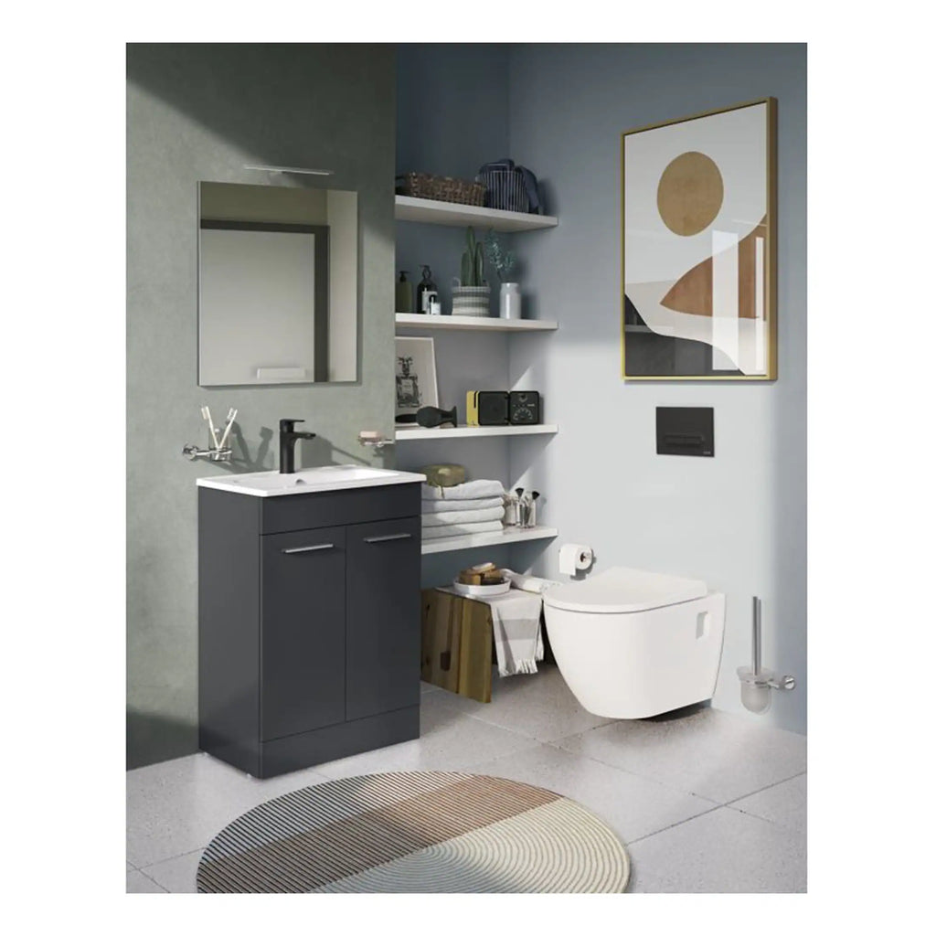 Contemporary bathroom featuring a sleek wall-mounted toilet, modern vanity unit with black finishes, open shelving with decorative accessories, and minimalist wall art for a stylish bathroom design.
