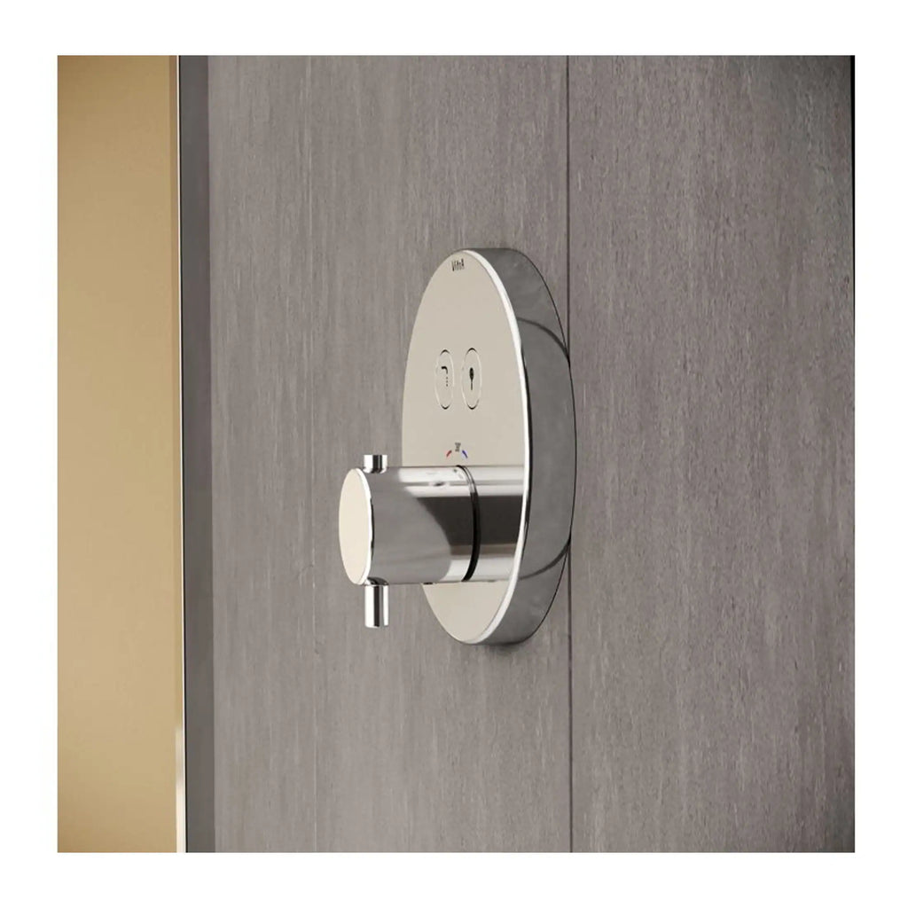 Chrome bathroom temperature control valve with digital display and easy-to-use interface, ideal for modern wet rooms and bespoke bathrooms. Perfect for precise water temperature adjustment.