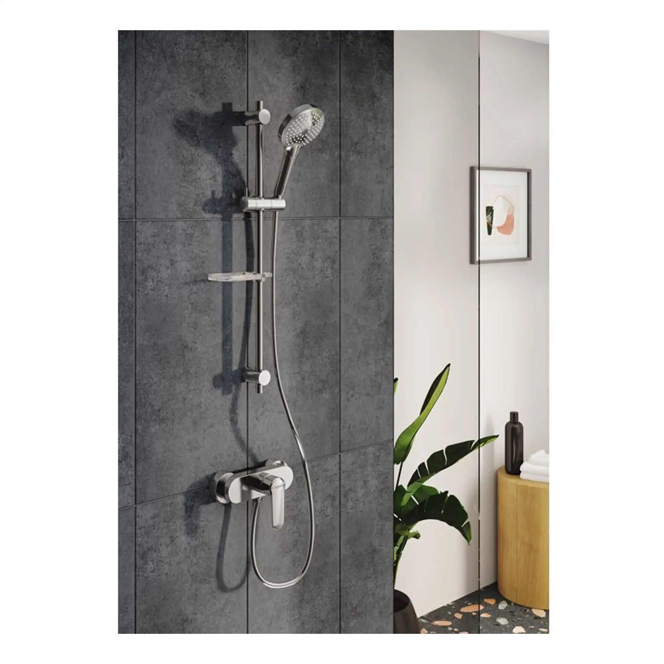 Sleek modern chrome shower panel with handheld shower head on dark textured wall in contemporary bathroom setting.