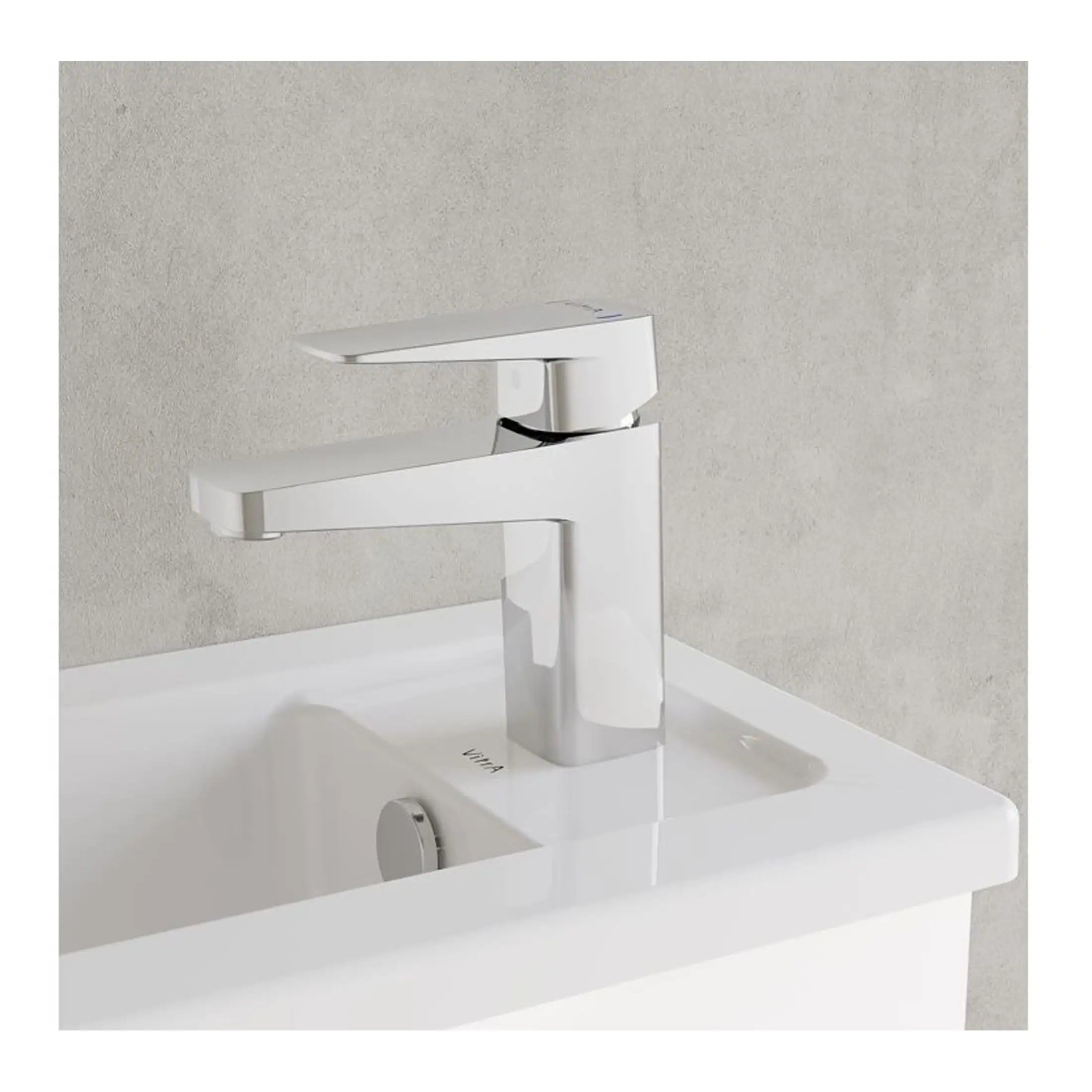 Sleek white modern bathroom sink with chrome single-handle faucet, minimalist design, ideal for contemporary bathrooms or washrooms, high-quality fixtures for stylish, functional space.