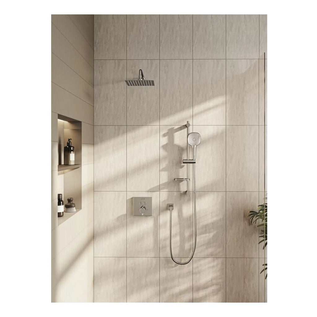 Modern beige tiled walk-in shower with rain shower head and handheld shower for luxury bathroom solutions.