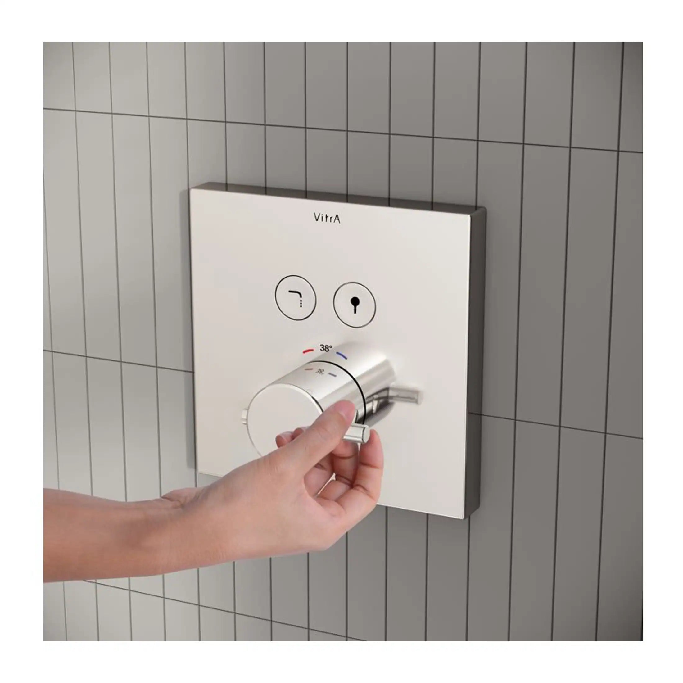 A modern thermostatic shower control panel with a sleek white design, featuring temperature adjustment knob and user interface for bespoke bathroom comfort.