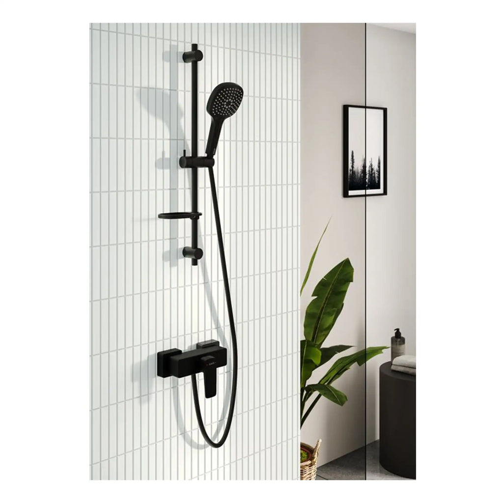 Modern black shower mixer and handheld shower head with adjustable slide and wall mount, installed in a contemporary bathroom with white tiled wall and minimalist decor.