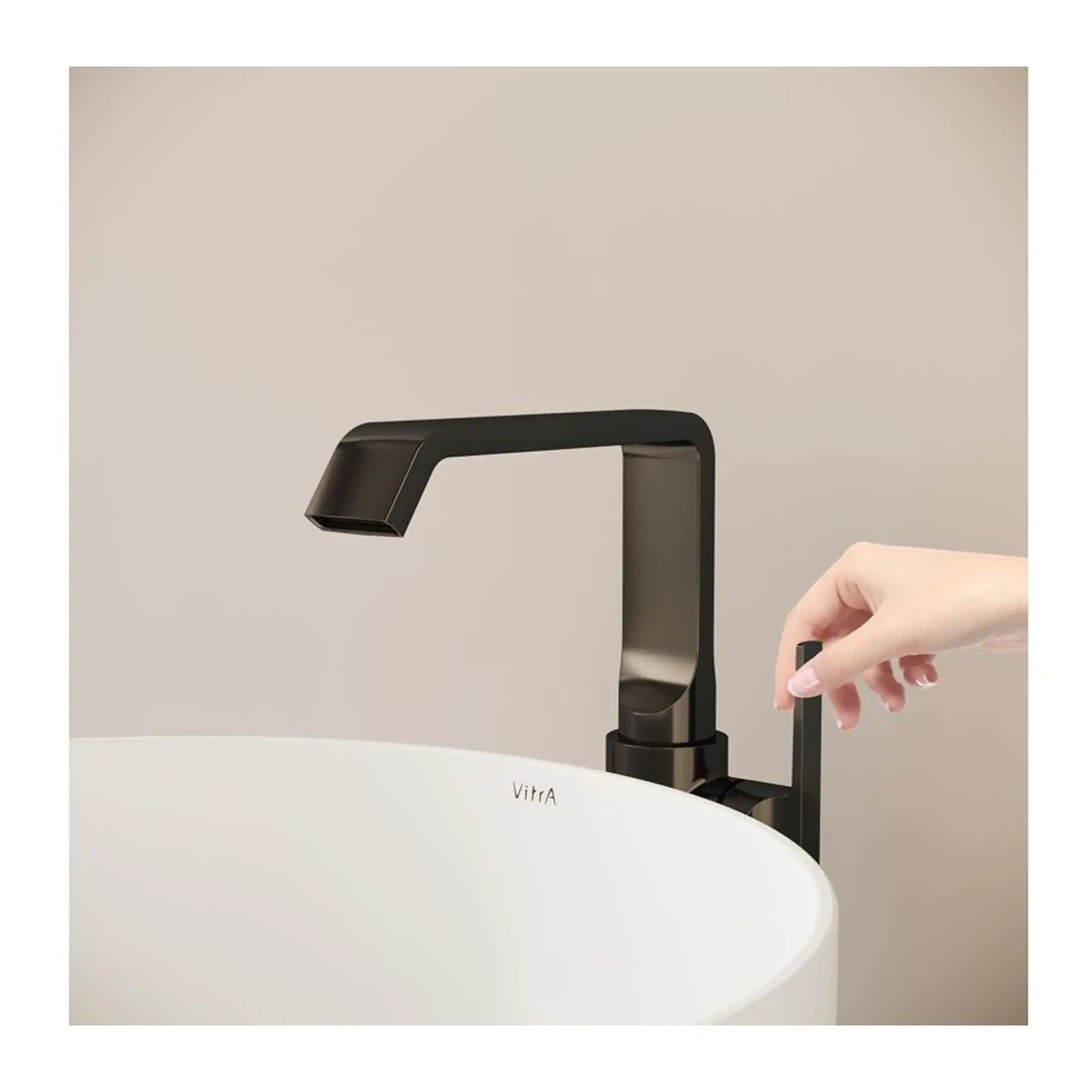 Sleek black bathroom faucet with minimalist design, modern tap for washbasin or sink, high-quality materials, contemporary bathroom accessories, stylish plumbing fixtures, Bubly Bathrooms UK.