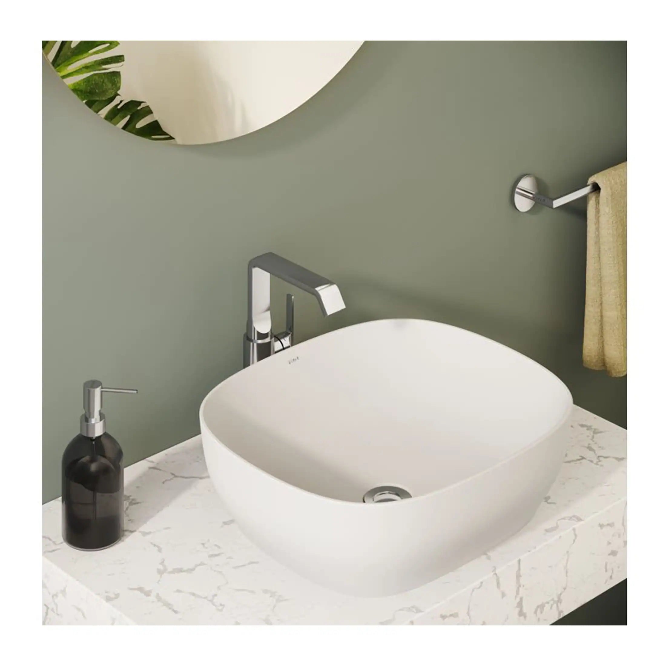 Vessel bathroom sink with modern chrome tap on marble countertop in contemporary bathroom setting.