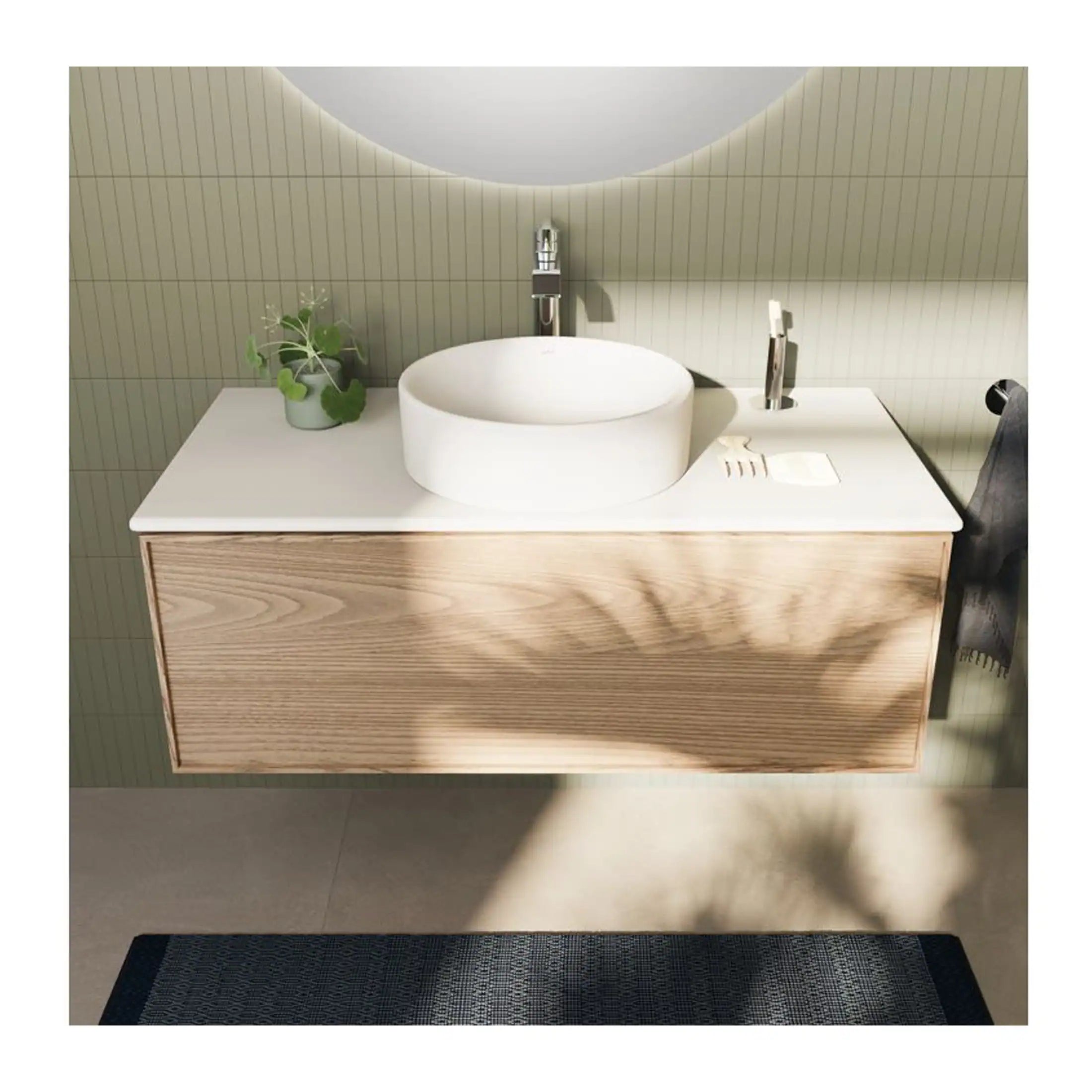 Contemporary bathroom vanity with a wooden cabinet, white countertop, round vessel sink, modern taps, green plant decor, and soft lighting creating a minimalist and stylish interior.