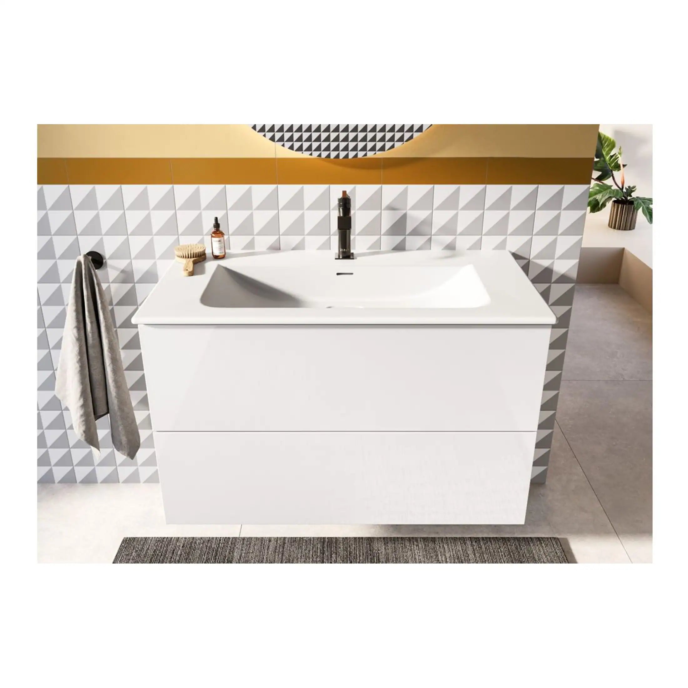 Sleek modern white bathroom vanity with integrated sink, minimalist design, set against geometric tiled wall, perfect for contemporary bathroom decor, featuring stylish accessories and a bathroom mirror.