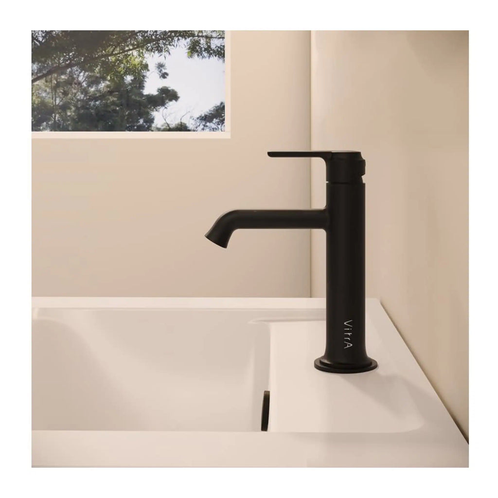 Sleek black kitchen sink faucet with modern matte finish, designed for contemporary bathroom or kitchen decor. Features a single handle and high arc spout for ease of use and style.