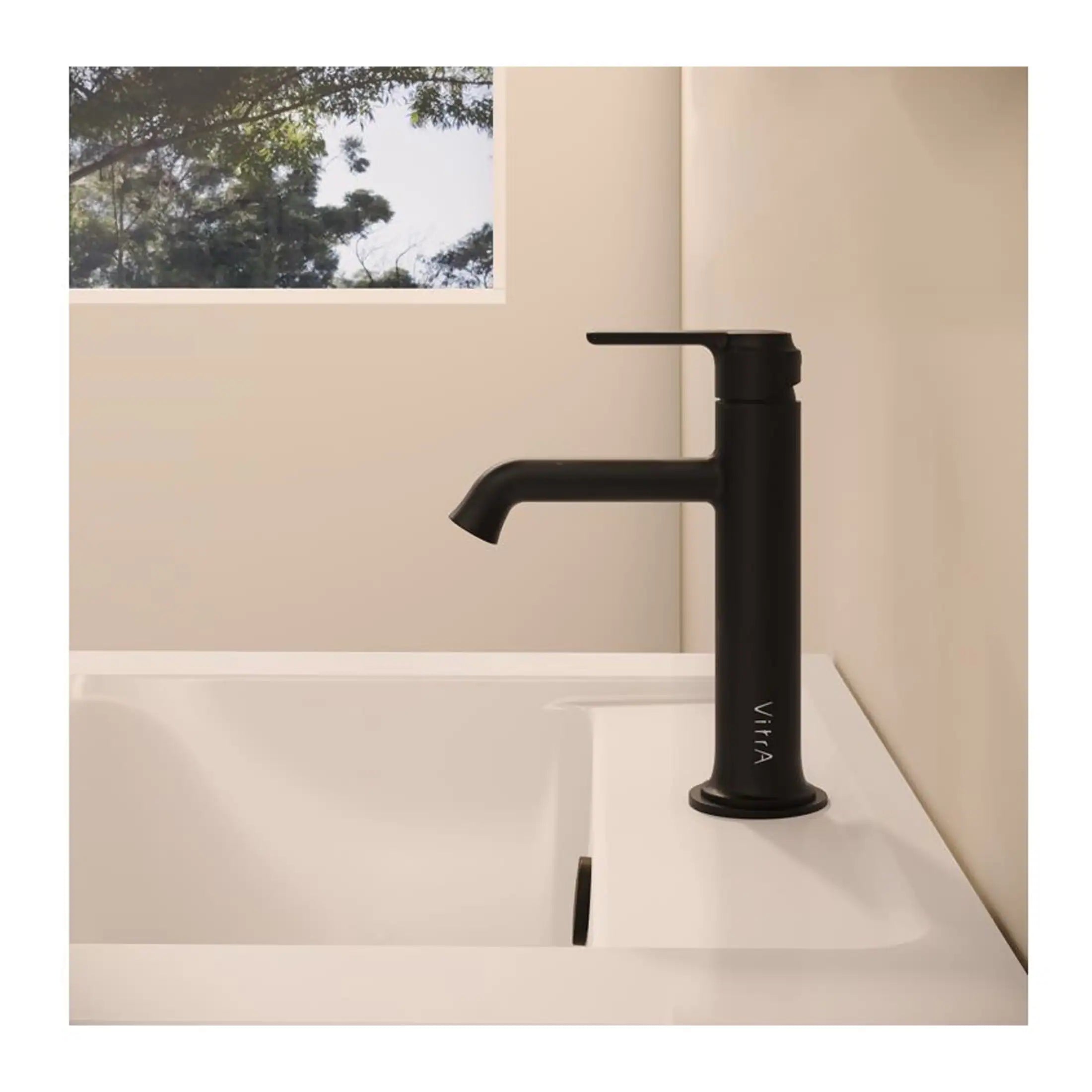 Sleek black kitchen sink faucet with modern matte finish, designed for contemporary bathroom or kitchen decor. Features a single handle and high arc spout for ease of use and style.