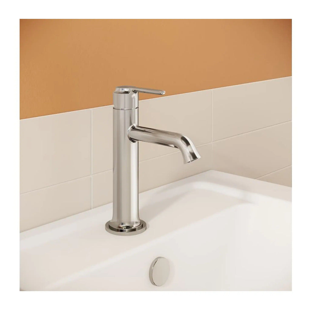 Sleek modern chrome bathroom tap installing above a white sink with beige tiled and terracotta wall backdrop. Hygienic and stylish design suitable for contemporary bathrooms and washbasins.