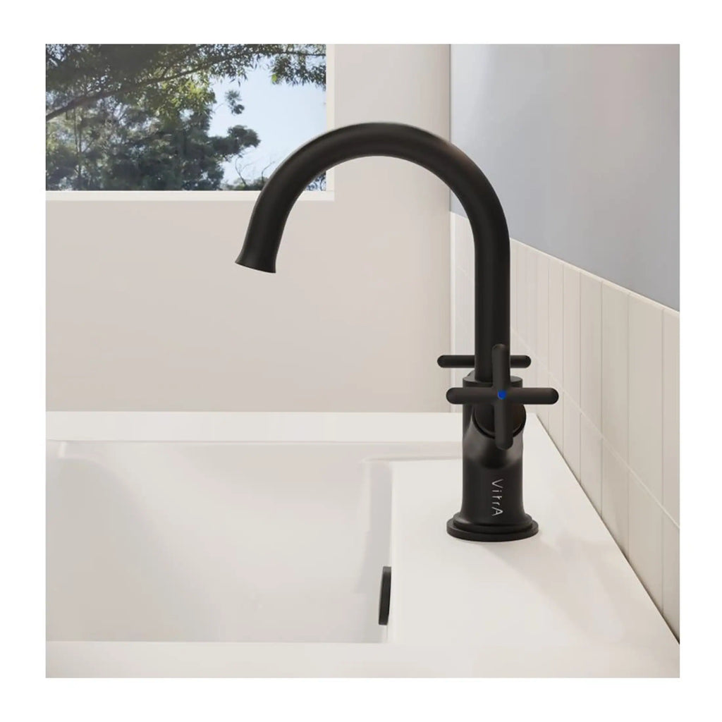 Sleek black kitchen or bathroom tap with modern design and matte finish, featuring a single handle for temperature control. Perfect for a contemporary bathroom or kitchen upgrade.