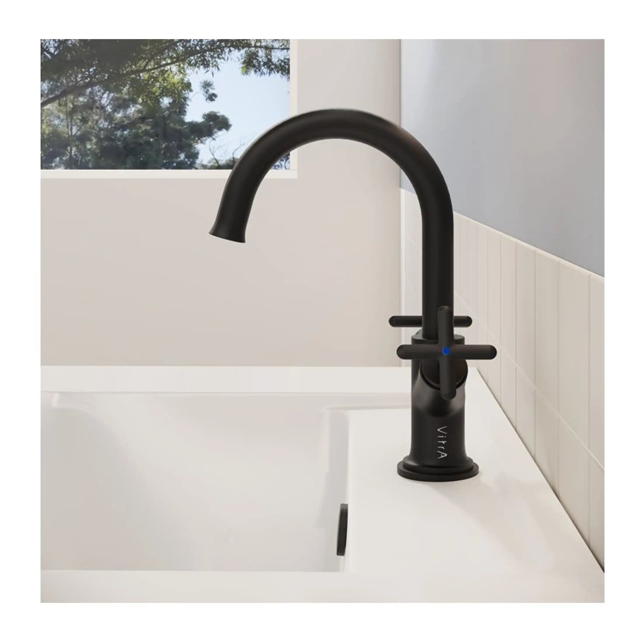 Sleek black kitchen or bathroom tap with modern design and matte finish, featuring a single handle for temperature control. Perfect for a contemporary bathroom or kitchen upgrade.
