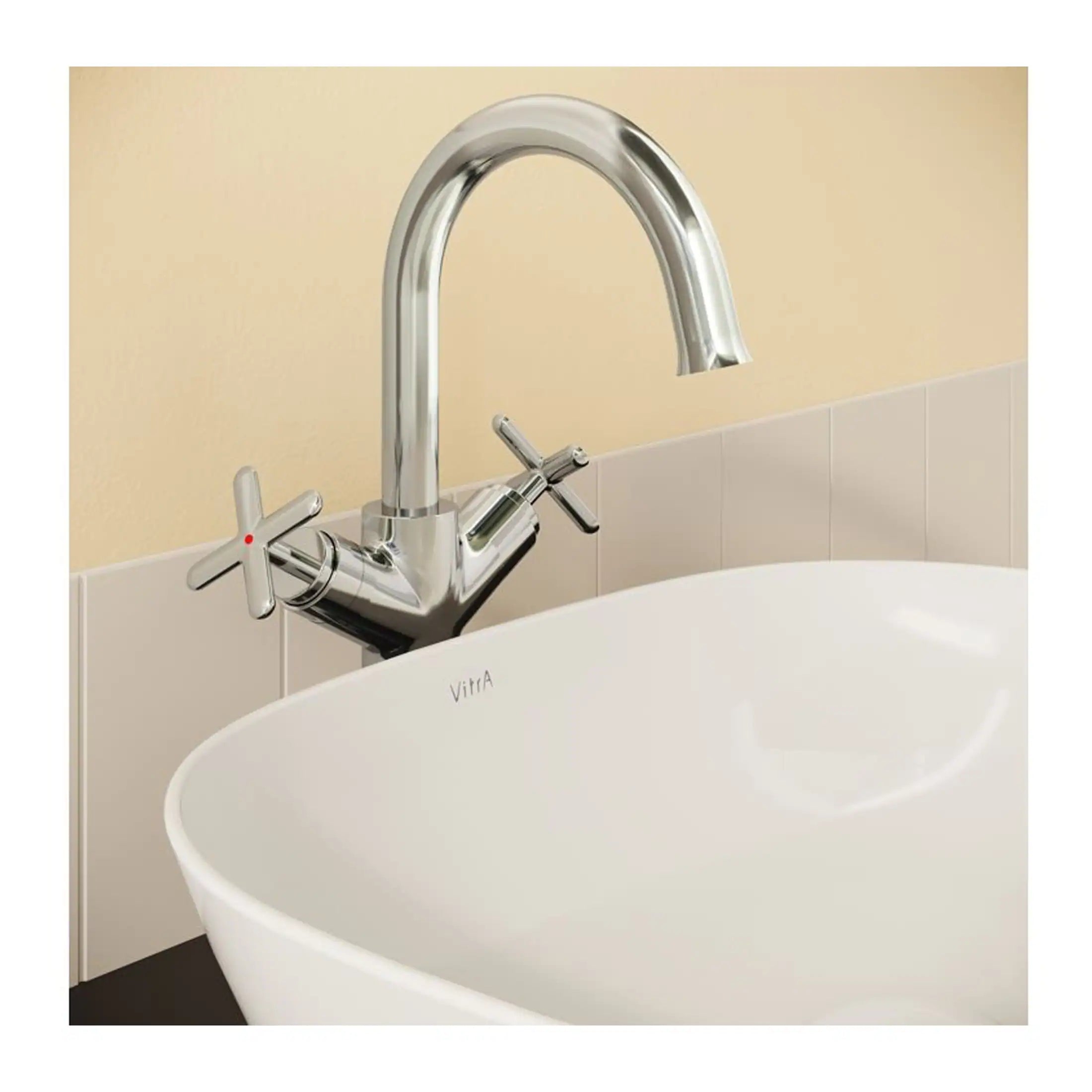 Sleek chrome bathroom taps with cross handles over a stylish freestanding bathtub, perfect for modern bathroom design and luxury bathing experiences.