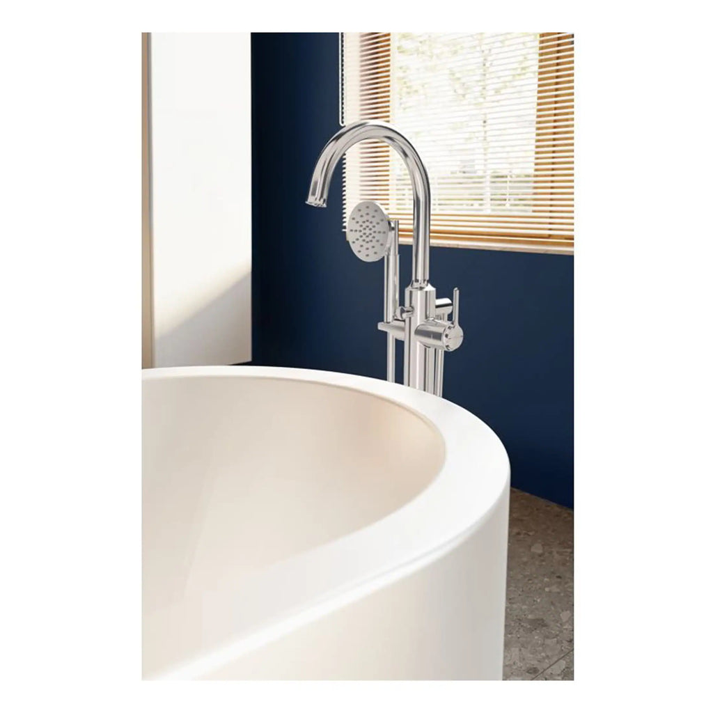 Sleek modern freestanding bathtub with chrome bath tap and hand shower, ideal for luxury bathroom designs and relaxing baths. Perfect for stylish and functional bathroom setups.
