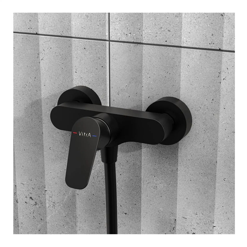 Sleek black bathroom faucet with modern design, wall-mounted Vitra bathroom fixtures, ideal for contemporary bathroom renovation, black matte finish, and easy-to-use controls.