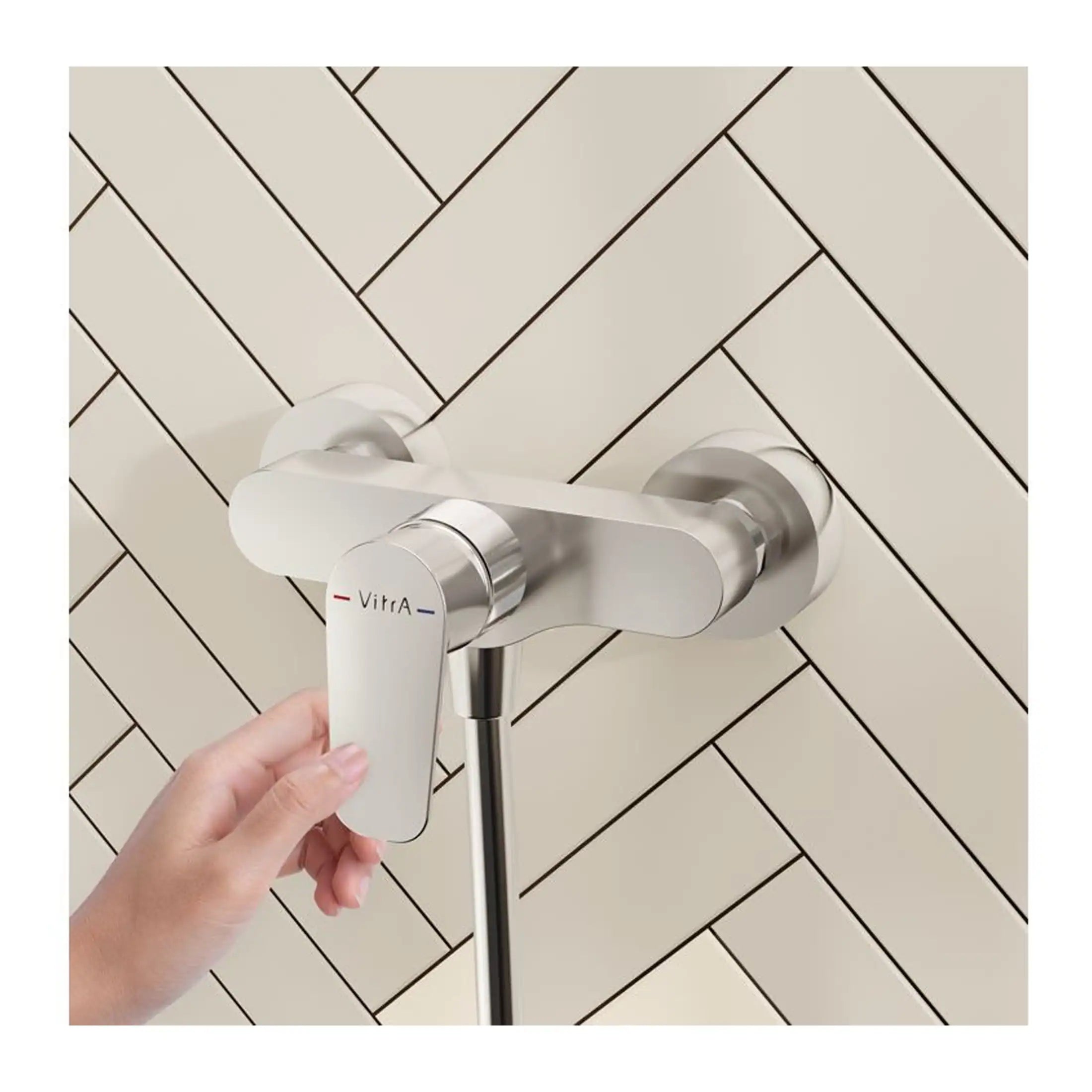 Modern stainless steel thermostatic shower valve with electronic control, installed on a beige tiled wall for a stylish bathroom upgrade.