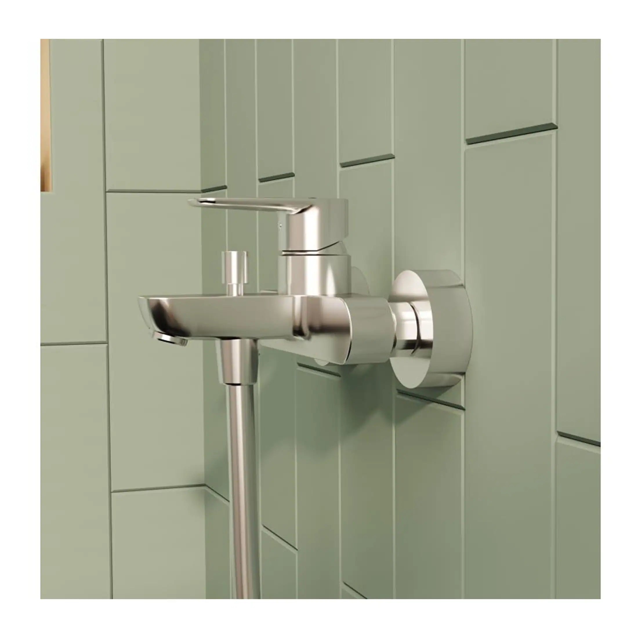 Modern stainless steel wall-mounted bathroom sink with sleek design and minimalist fixtures, set against a soft green tiled wall for a contemporary bathroom aesthetic.