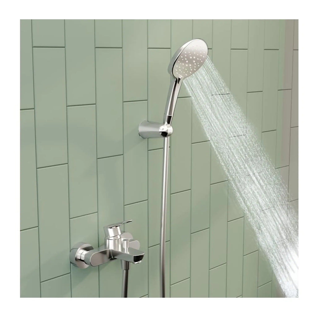 Shower head with handheld attachment in modern bathroom with green tiled wall, chrome finish, rainfall water flow, ideal for contemporary bathroom renovation or upgrade.
