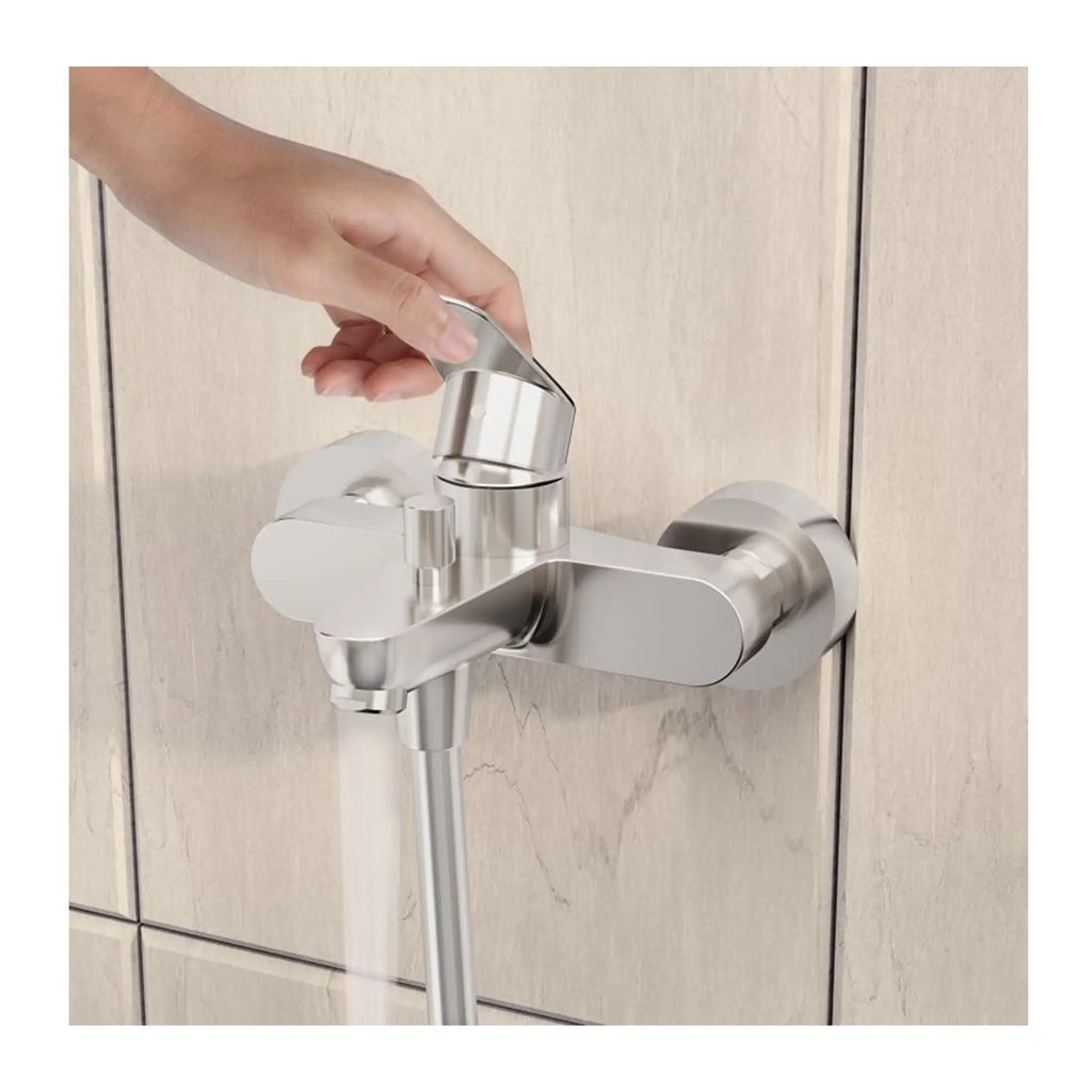 Drain tap with hand turning the handle, modern bathroom faucet, stainless steel water tap, wall-mounted bathroom fixtures, easy-to-use plumbing accessories for home bathrooms.