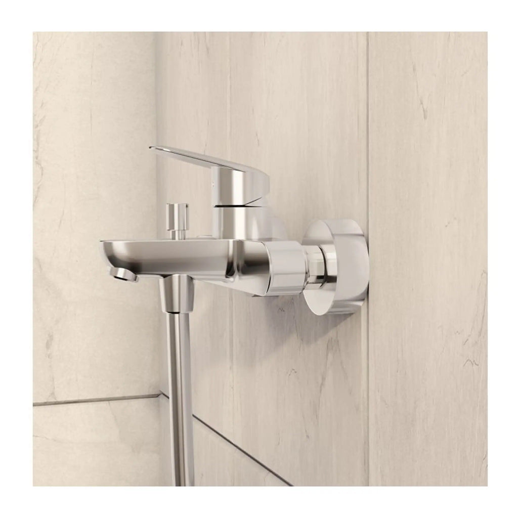 Sleek modern chrome bathroom tap with a minimalist design, mounted on a tiled wall, ideal for contemporary bathroom renovation and stylish sink setups.