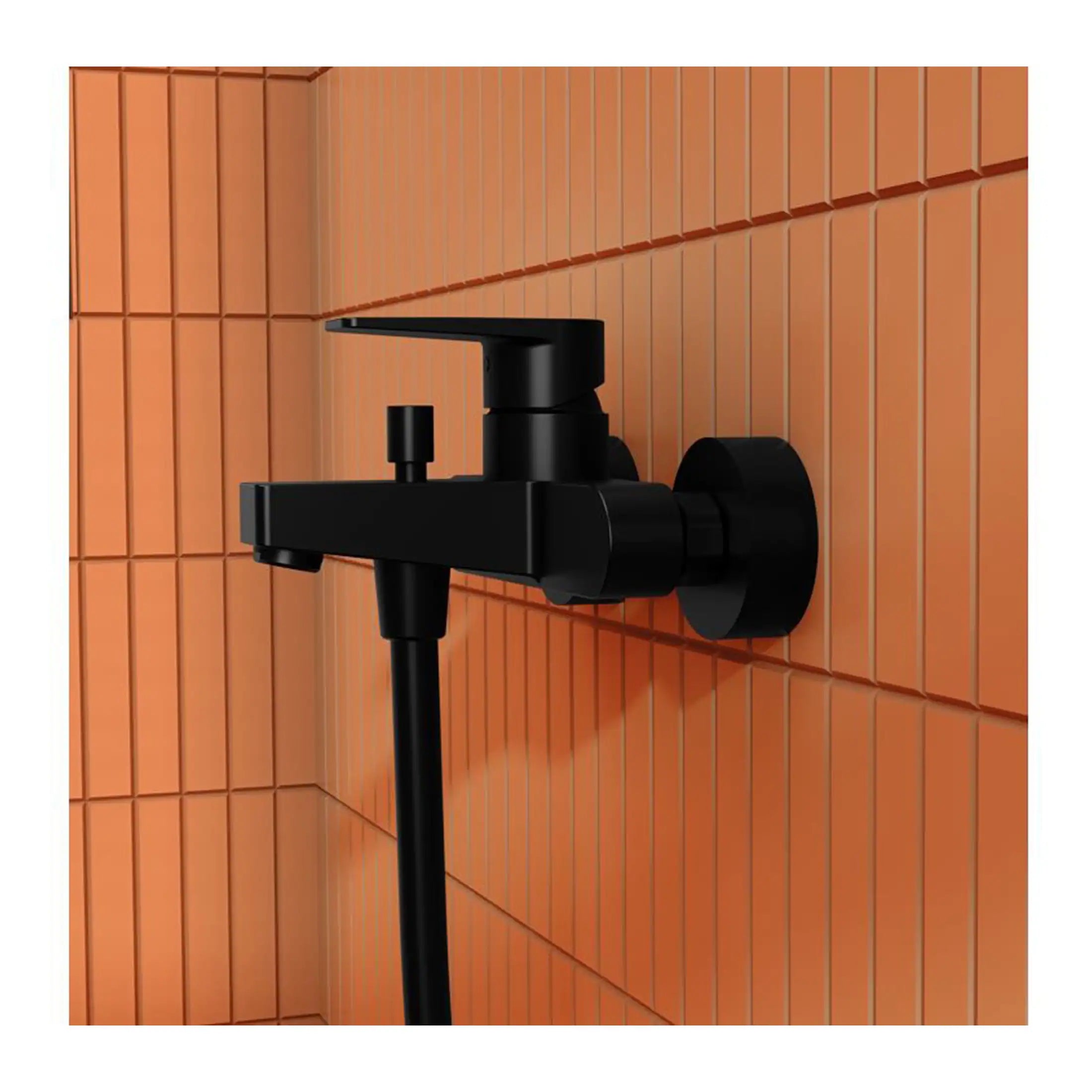 Black bathroom faucet with a wall-mounted design against orange tiled wall. Perfect for modern bathroom sink installation, combining style and functionality.