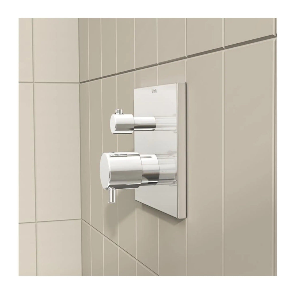 Sleek modern shower control panel with chrome finish, wall-mounted thermostatic mixer for contemporary bathroom design.