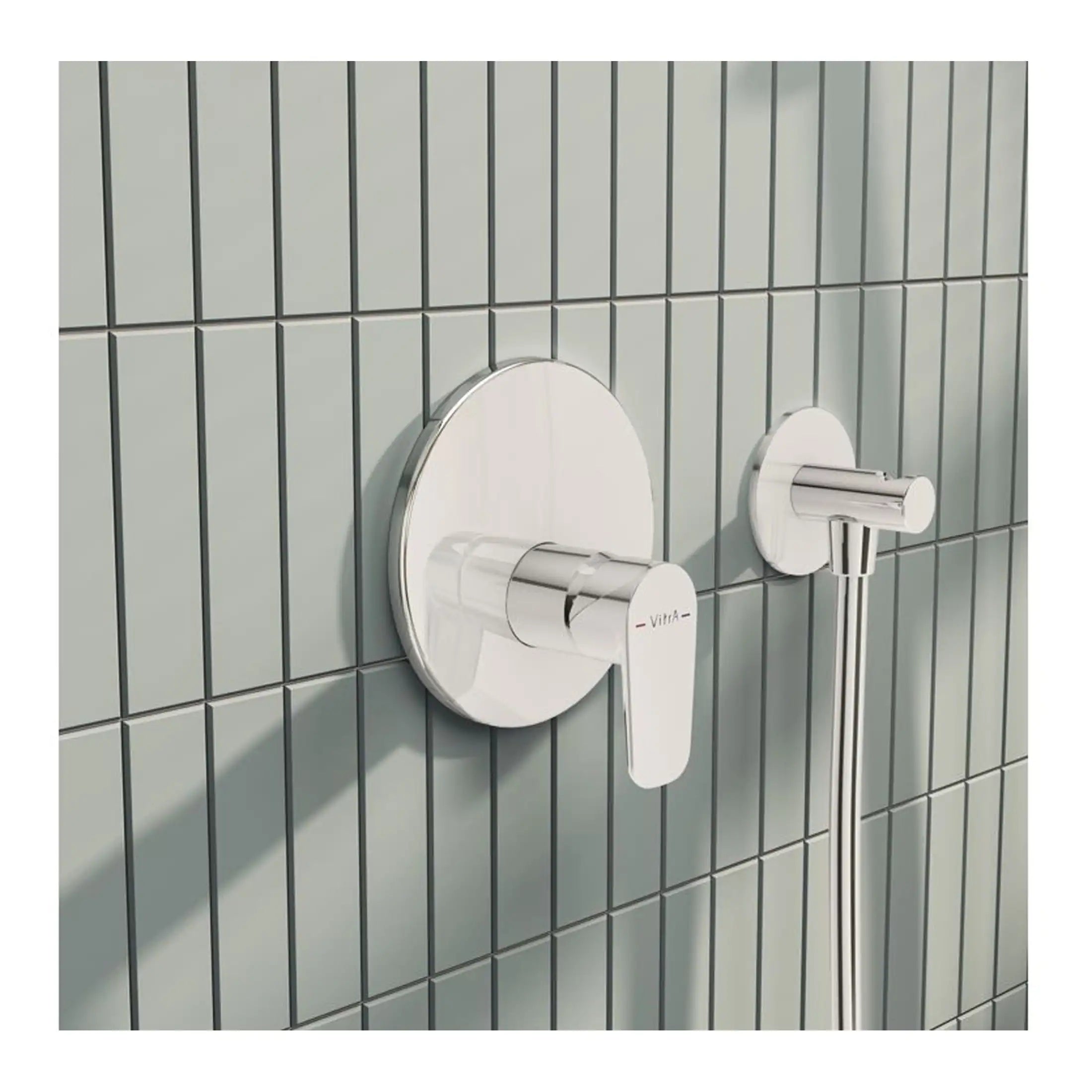 Shower control valve with chrome finish mounted on tiled bathroom wall, modern plumbing fixture for bathroom renovation, part of Bubly Bathrooms' stylish bathroom fittings collection.