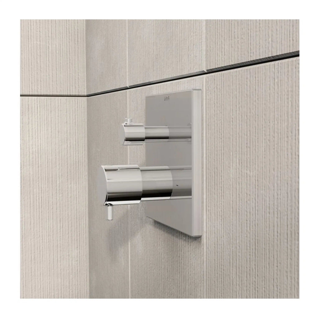 Sleek modern dual flush toilet flush buttons with chrome finish on textured beige wall tiles, perfect for contemporary bathroom design.