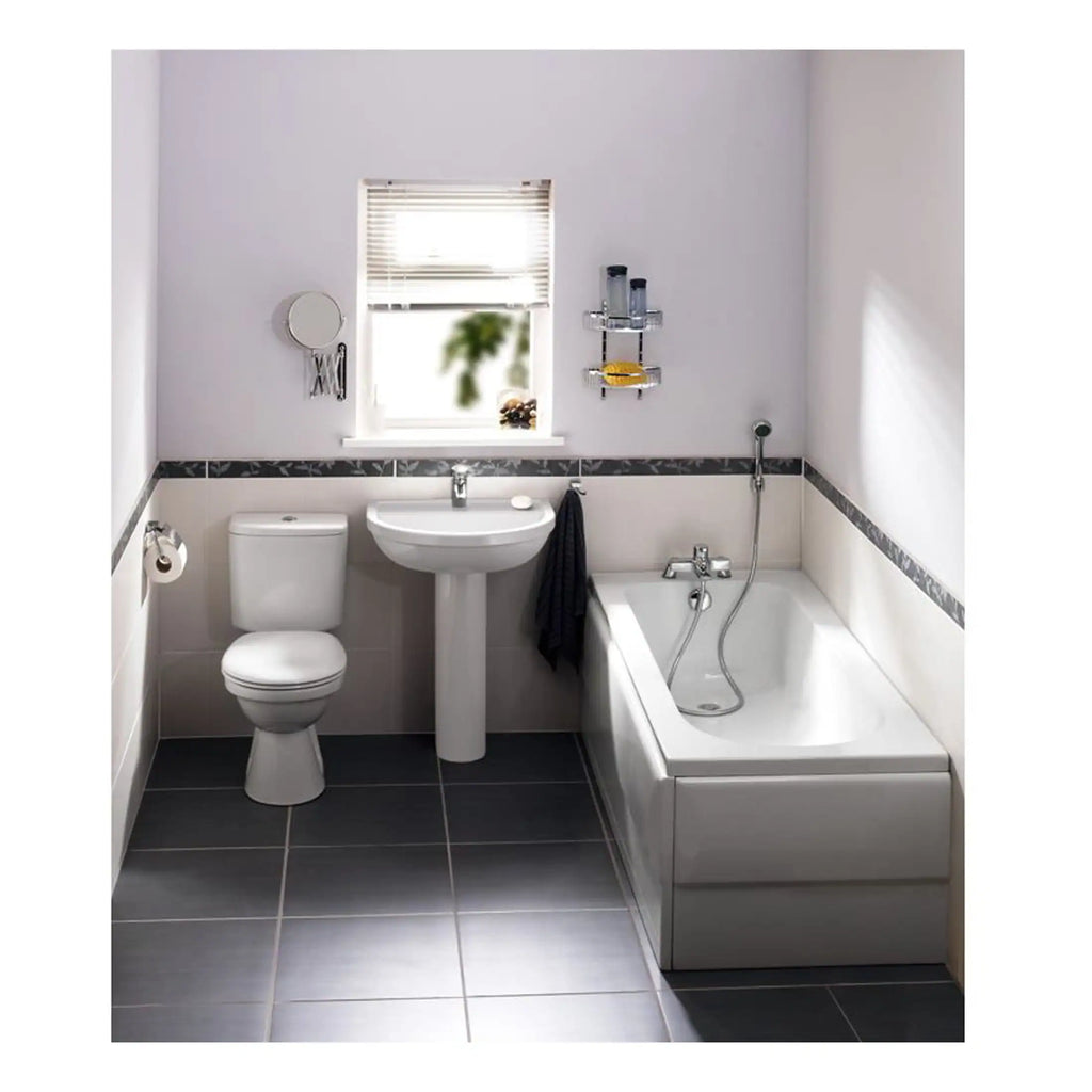 Modern white bathroom with bathtub, toilet, and sink, featuring contemporary tiling and fixtures; ideal for small spaces seeking a sleek, clean look.