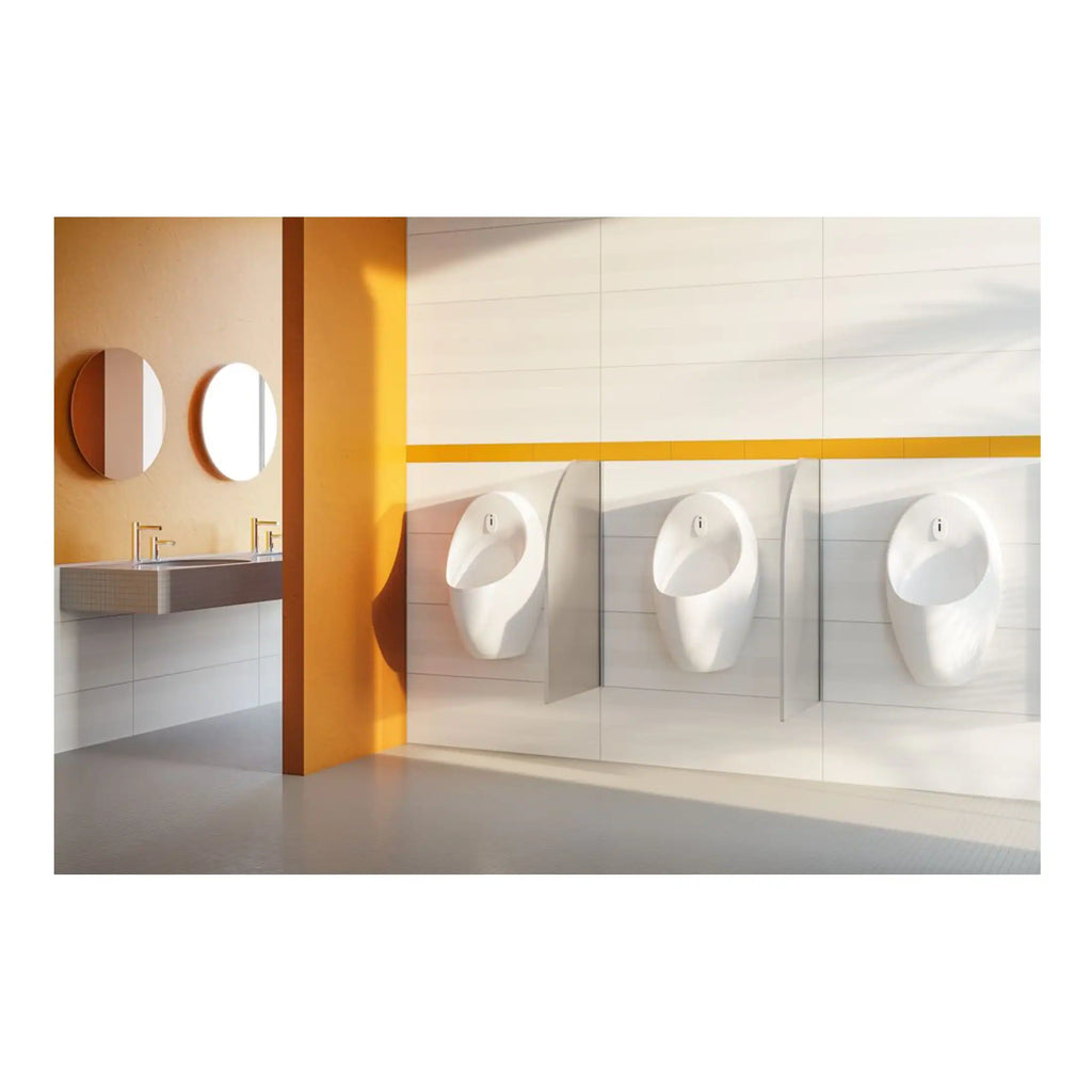 Modern commercial bathroom with three white urinals and two mirrors, designed for hygiene and cleanliness, featuring contemporary fixtures and decor for a professional setting.